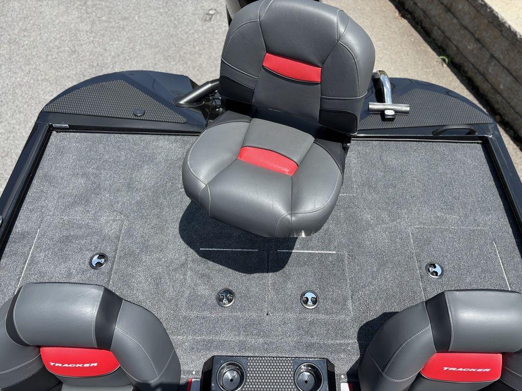 2025 Tracker SAVAGE™ 215 boat interior with gray and red seating.