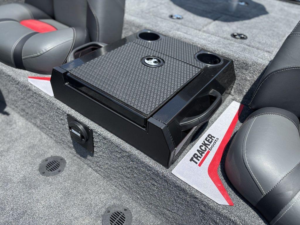 Interior of 2025 Tracker SAVAGE™ 215 boat with seating and storage console.