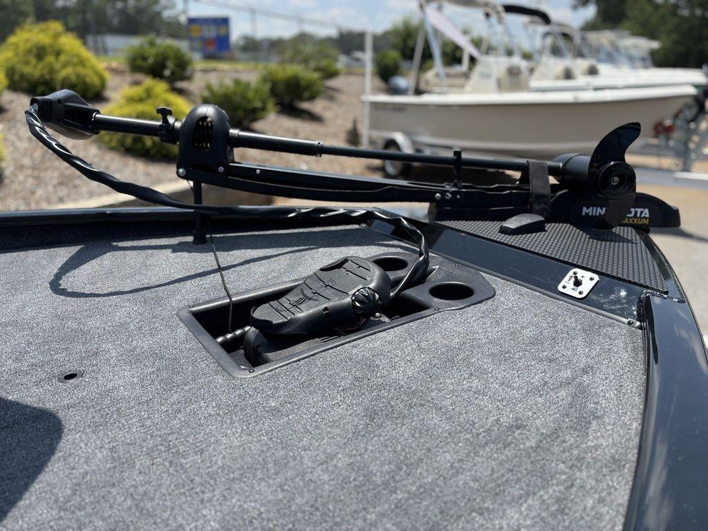 2025 Tracker SAVAGE™ 215 boat deck with trolling motor and foot pedal controls.
