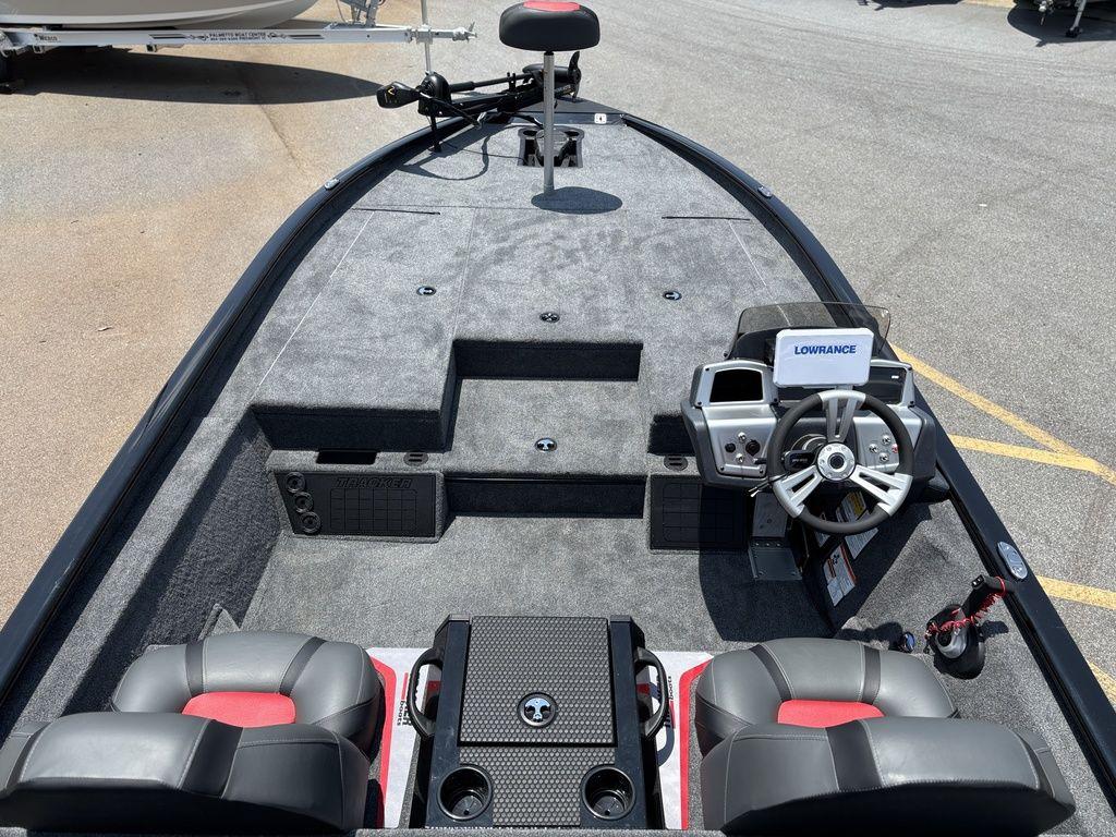 2025 Tracker SAVAGE™ 215 boat interior with steering console and seating.