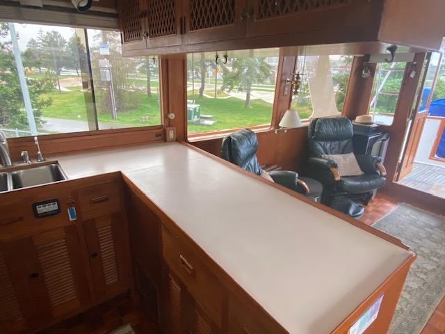Ocean Alexander-50 MK1 1980 -WA-US-Interior of 1980 Ocean Alexander 50 MK1 yacht with wooden cabinetry and seating area.-9725618 | Thumbnail