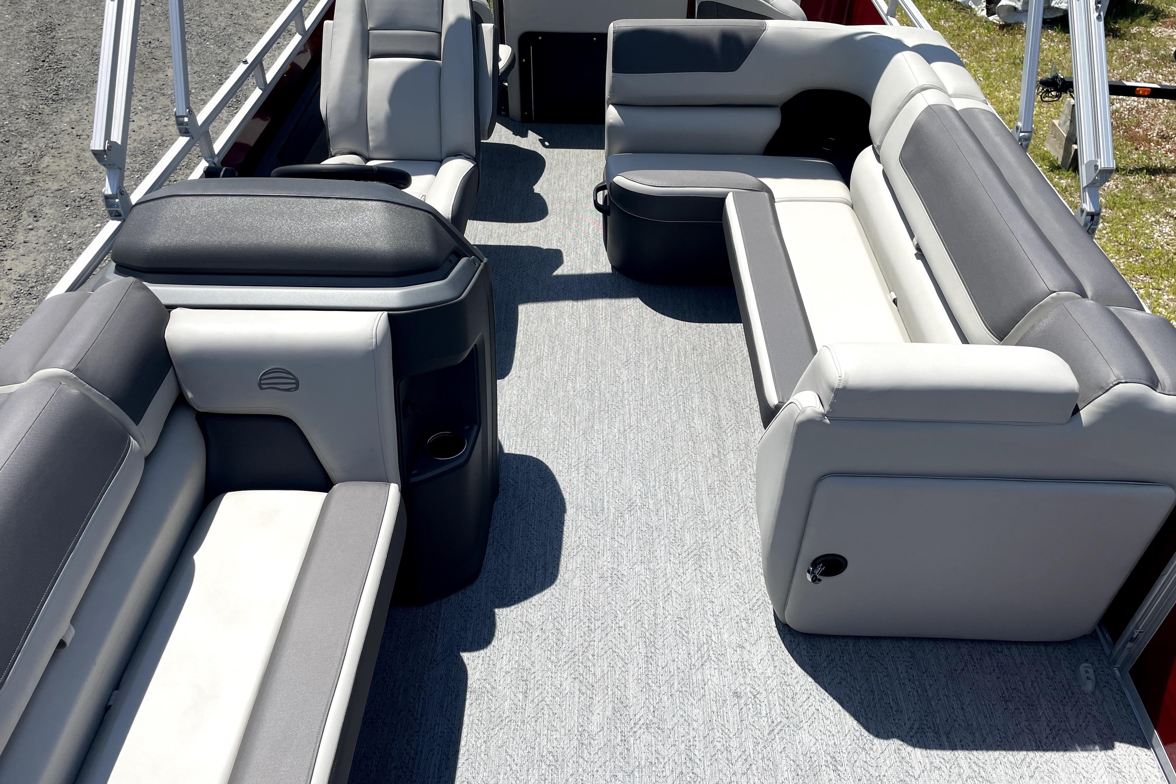 2026 Sun Tracker Fishin' Barge 22 DLX interior with spacious seating and modern design.
