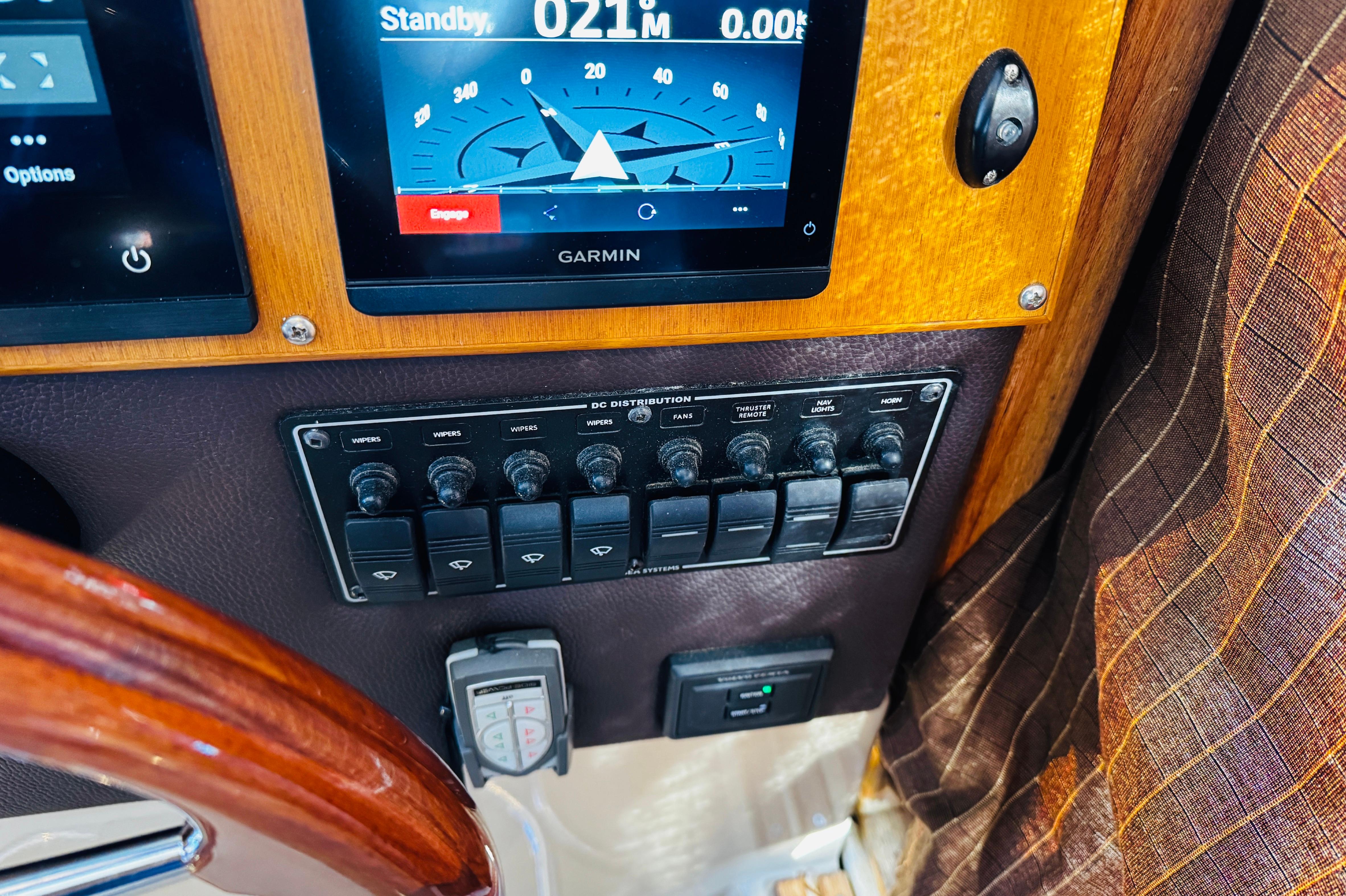 Control panel of a 2012 Ranger Tugs R-31 with Garmin navigation display.