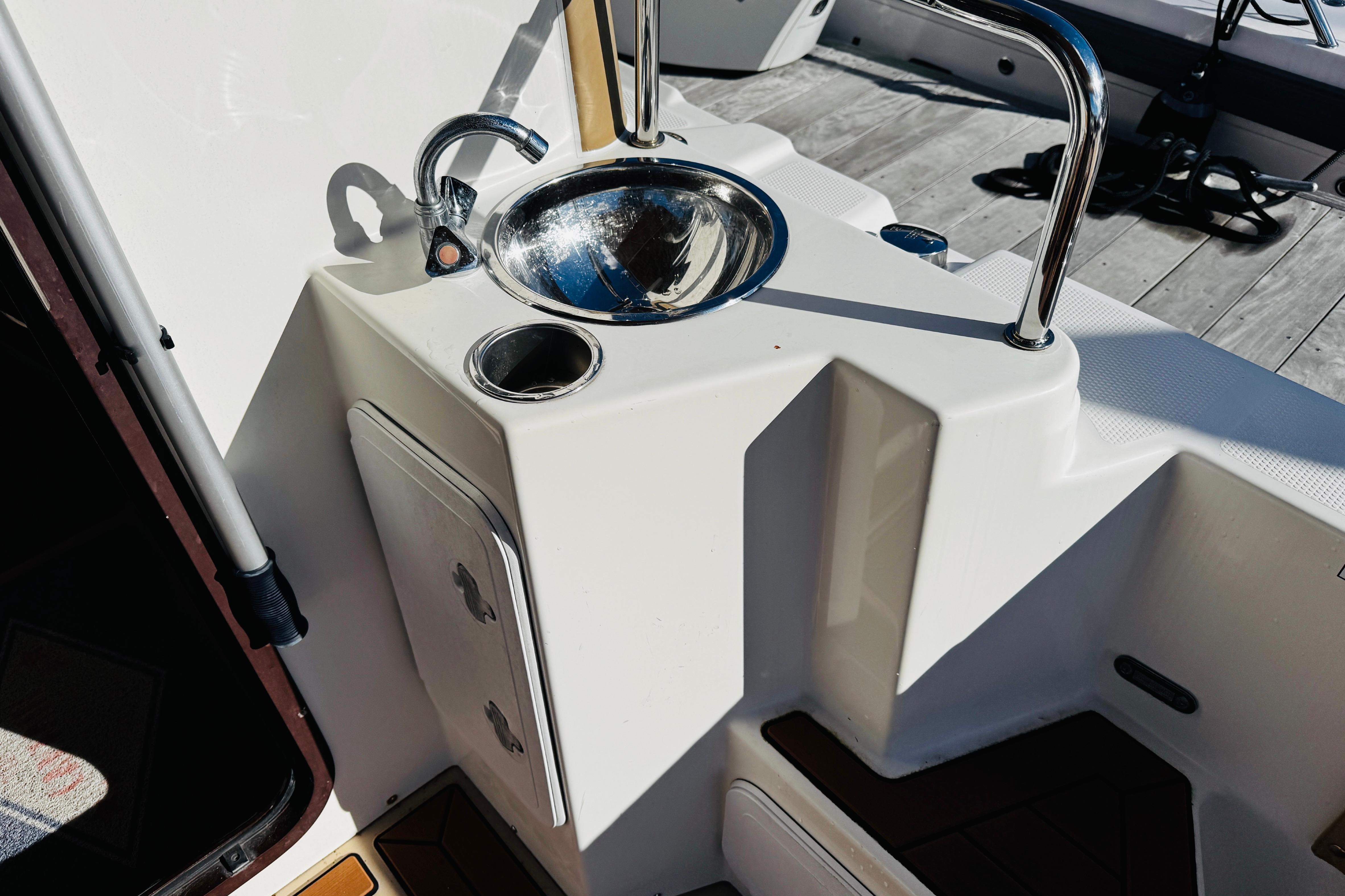 2012 Ranger Tugs R-31 boat sink and storage area on deck.