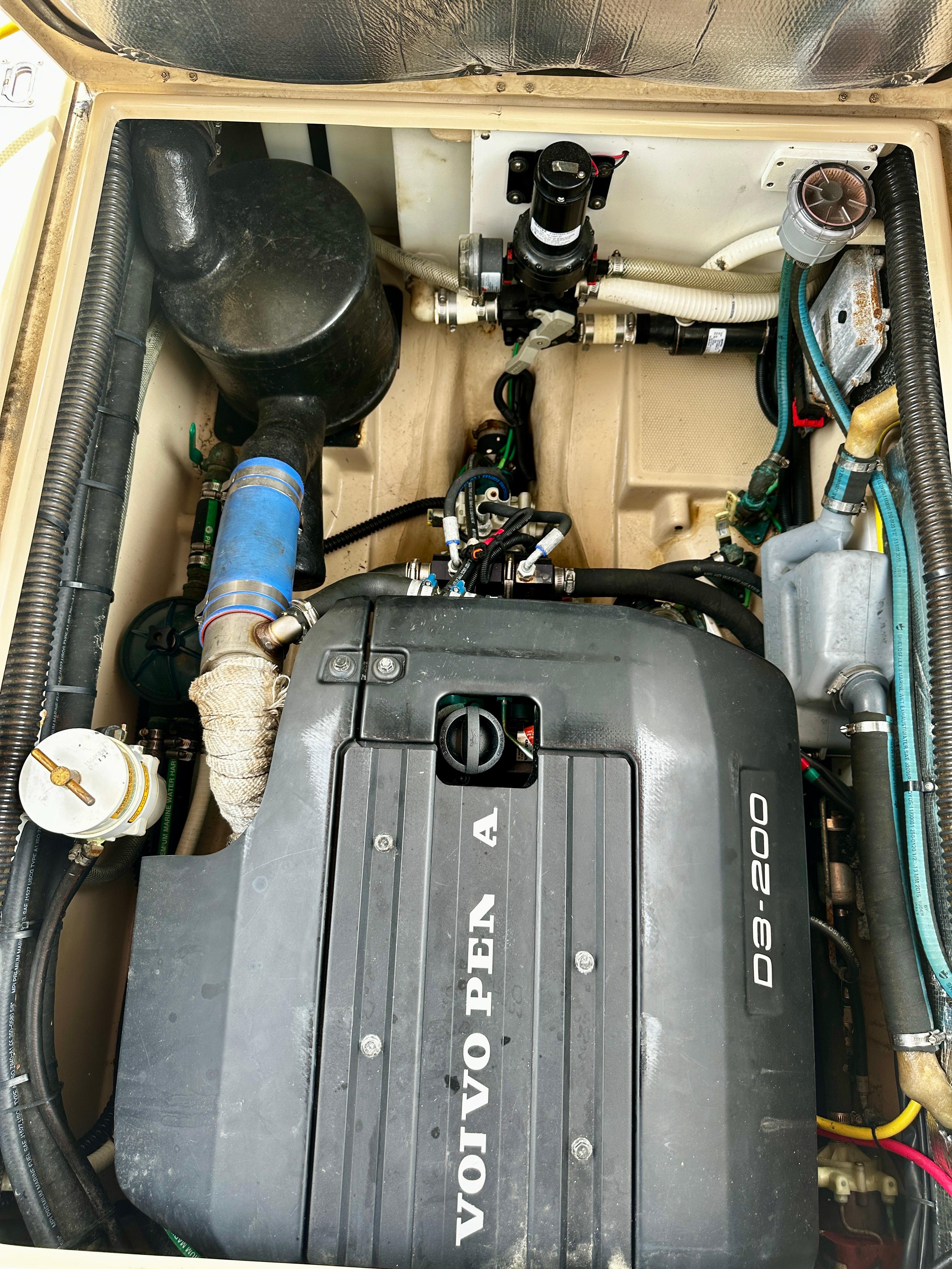 Engine compartment of a 2014 American Tug R-27 with Volvo Penta D3-200 engine.