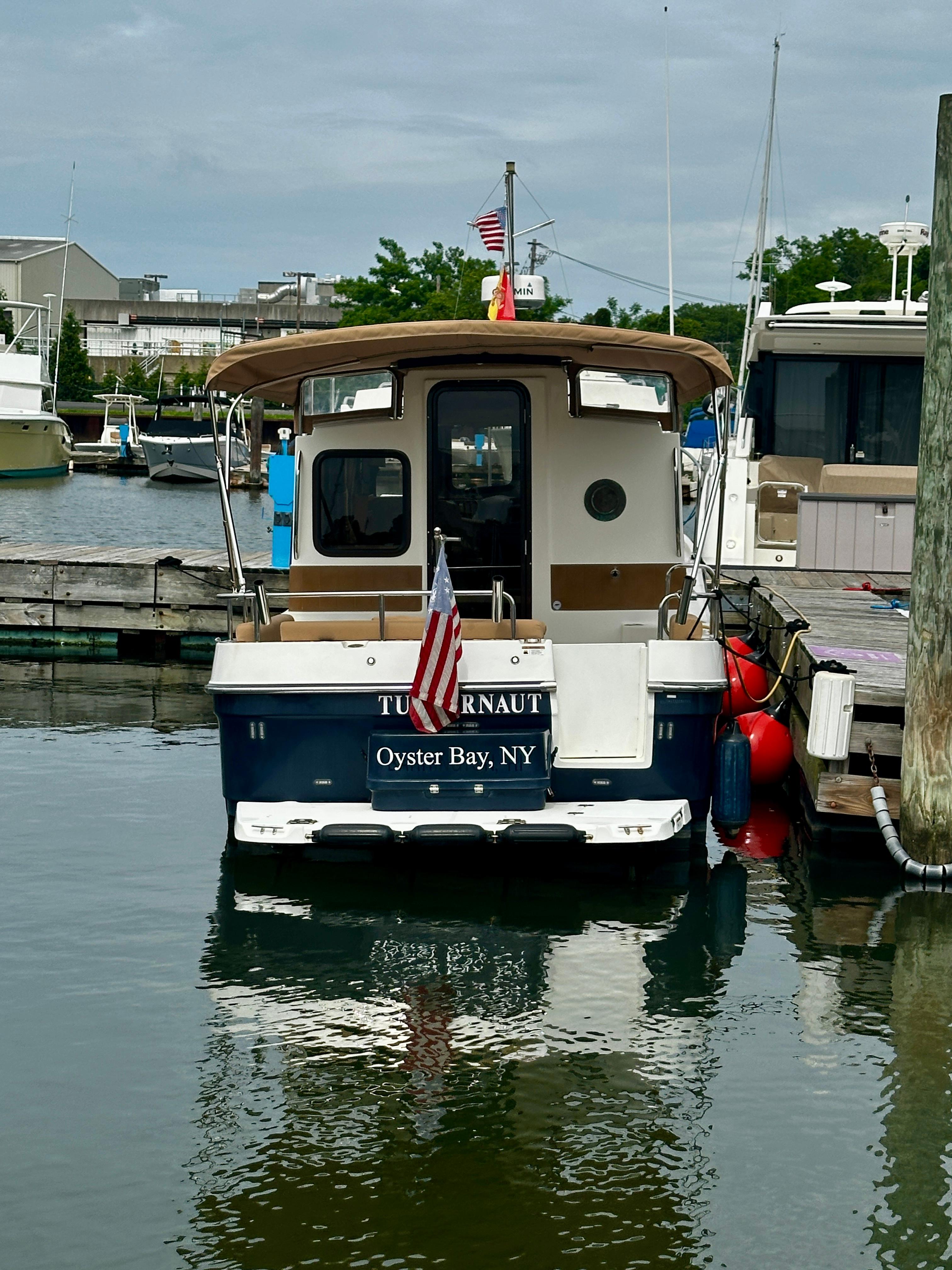 2014 American Tug R-27 docked in Oyster Bay, NY marina.