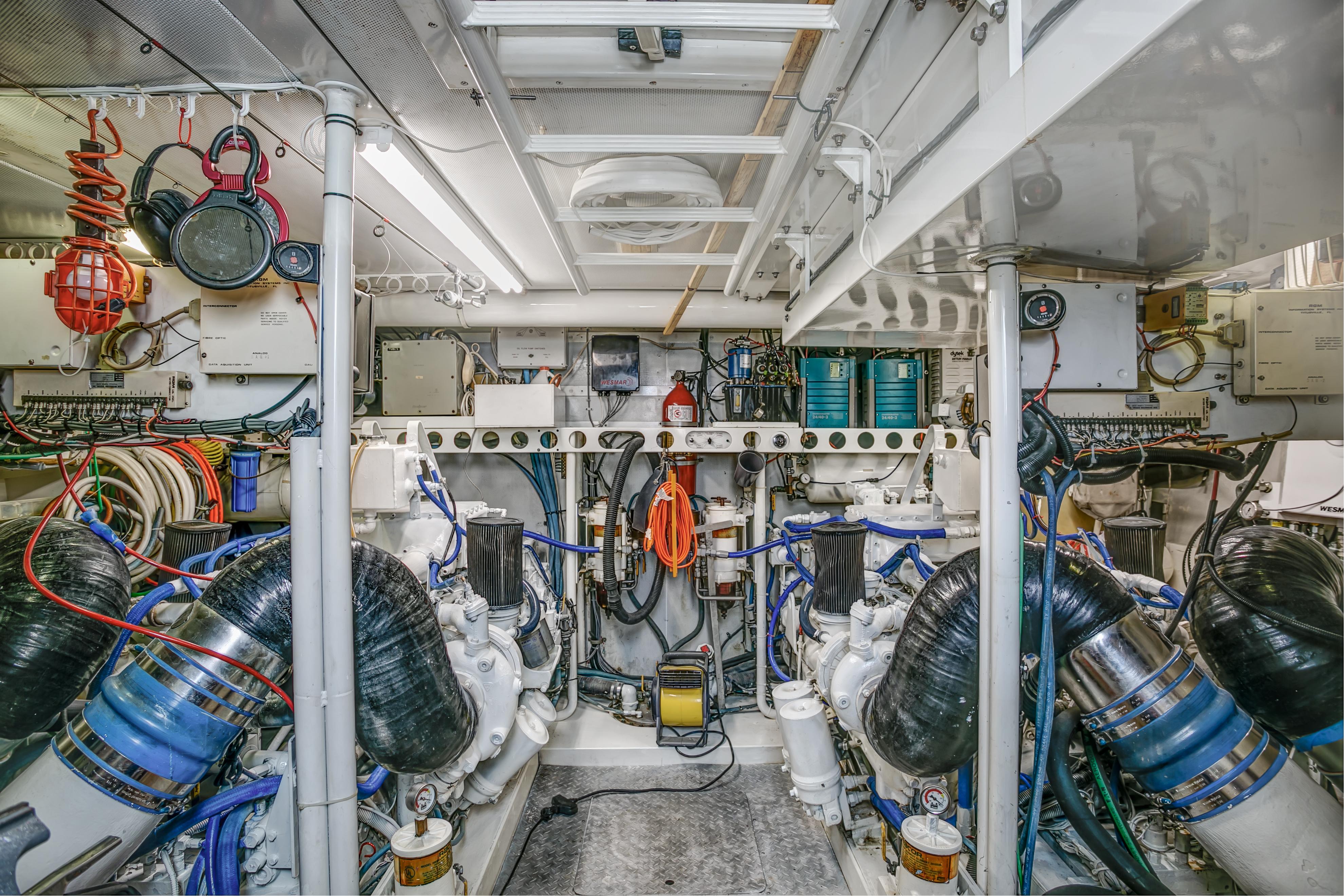 Lazzara-76 1994-MAUTICA FL-US-Engine room of a 1994 Lazzara 76 yacht, showcasing complex machinery and equipment.-9595695 | Thumbnail