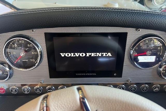 Dashboard of 2024 Chris-Craft Launch 27 with Volvo Penta display and gauges.