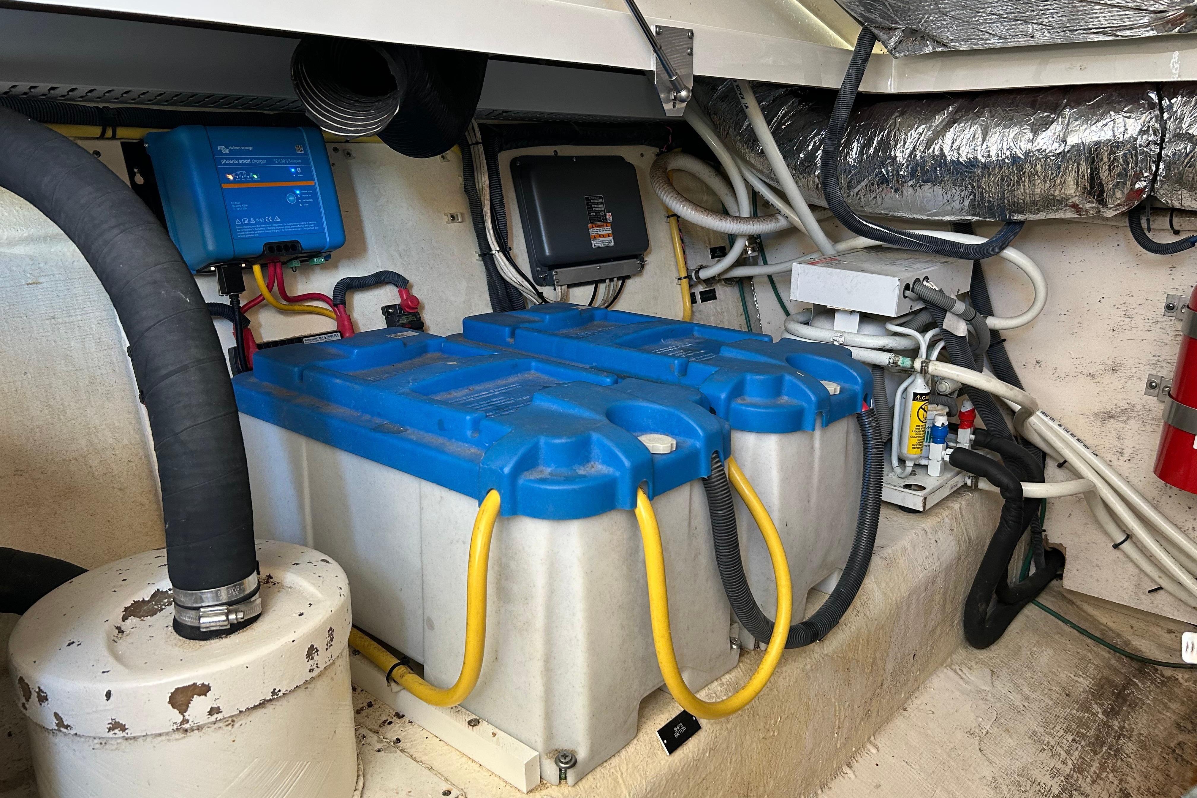 Electrical system of a 2008 Back Cove 33 boat, featuring batteries and wiring.