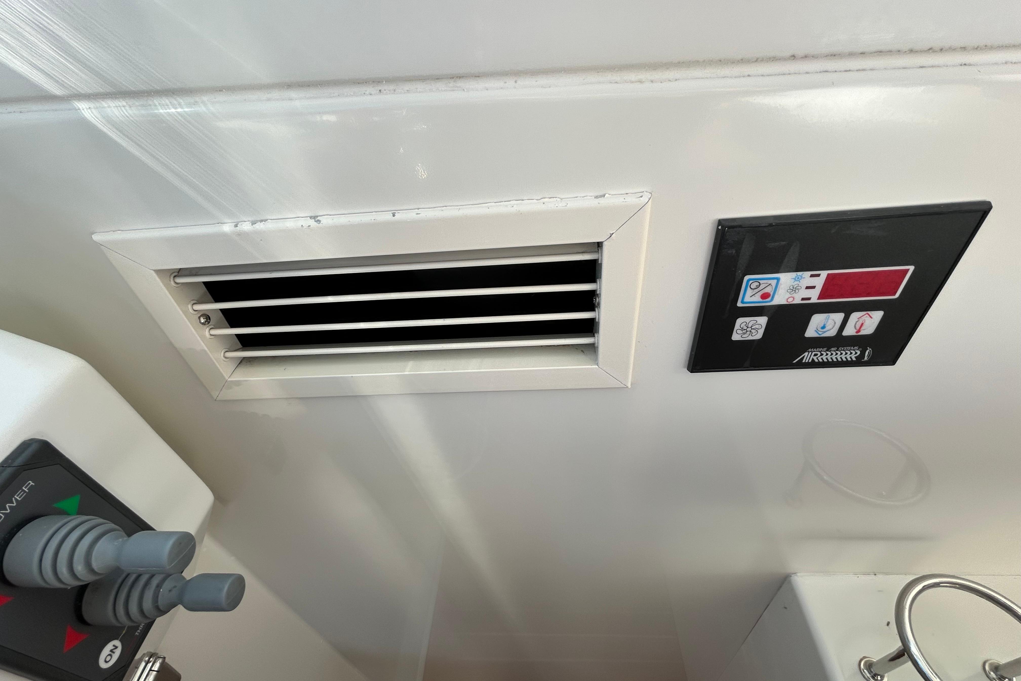 2008 Back Cove 33 boat interior showing control panel and air vent.