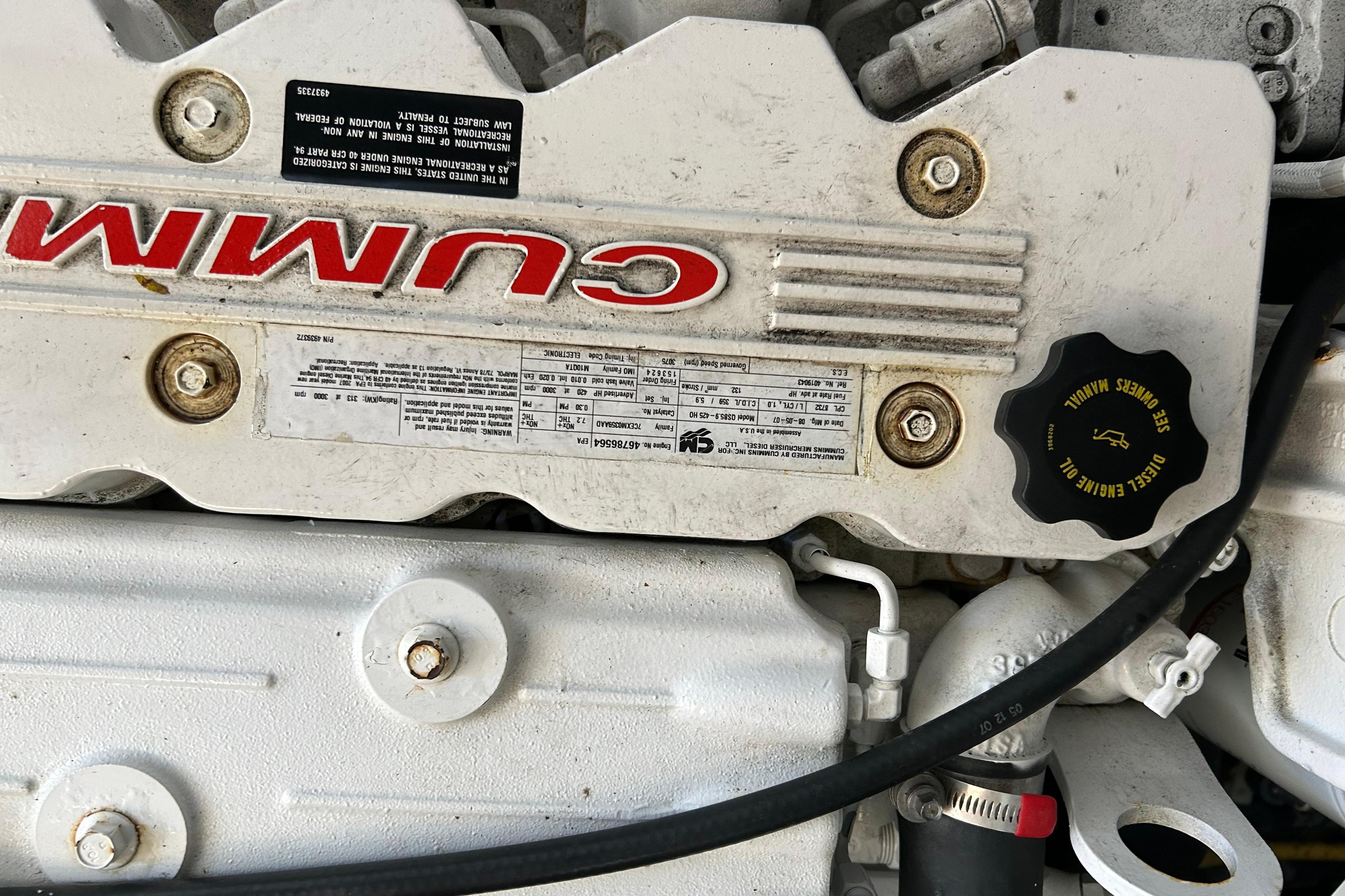 Close-up of a Cummins engine in a 2008 Back Cove 33 boat.