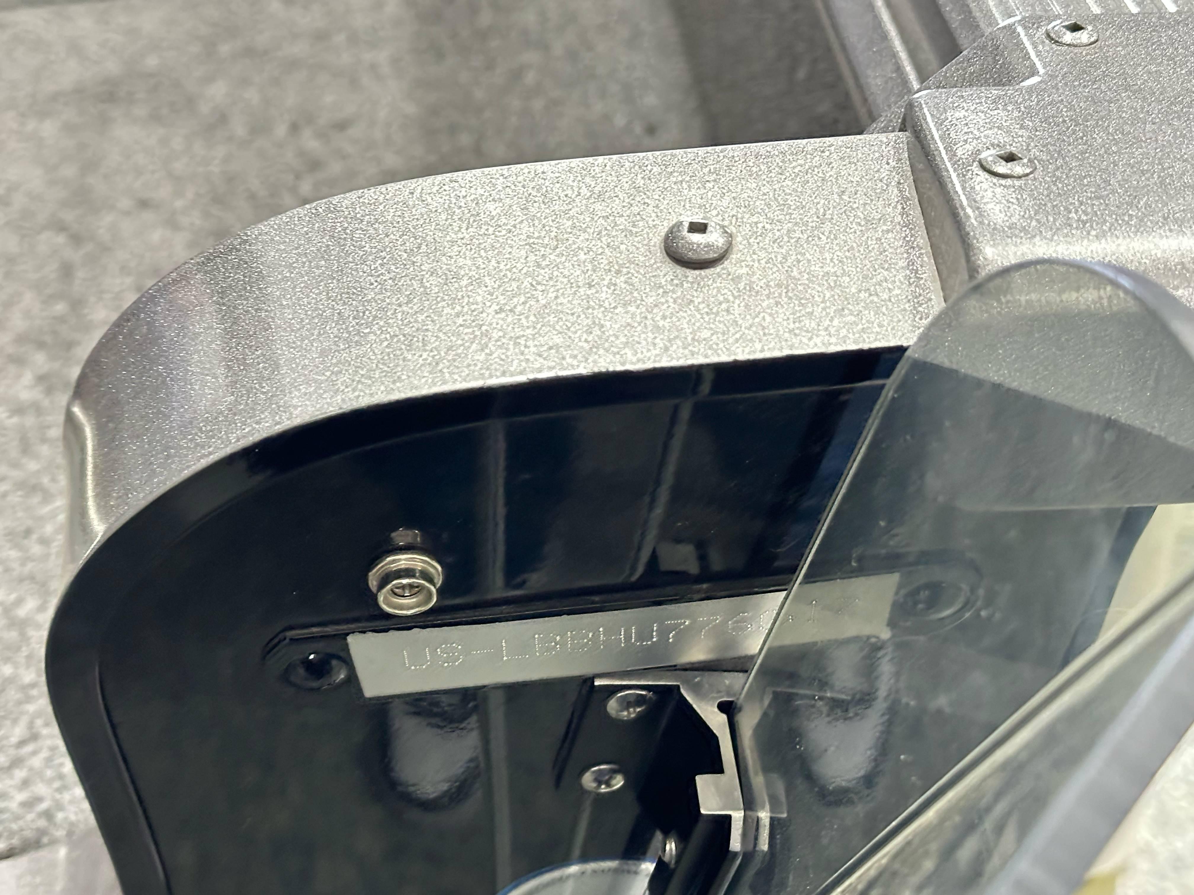2017 Lund 1675 Impact SS boat detail showing serial number plate and hardware.