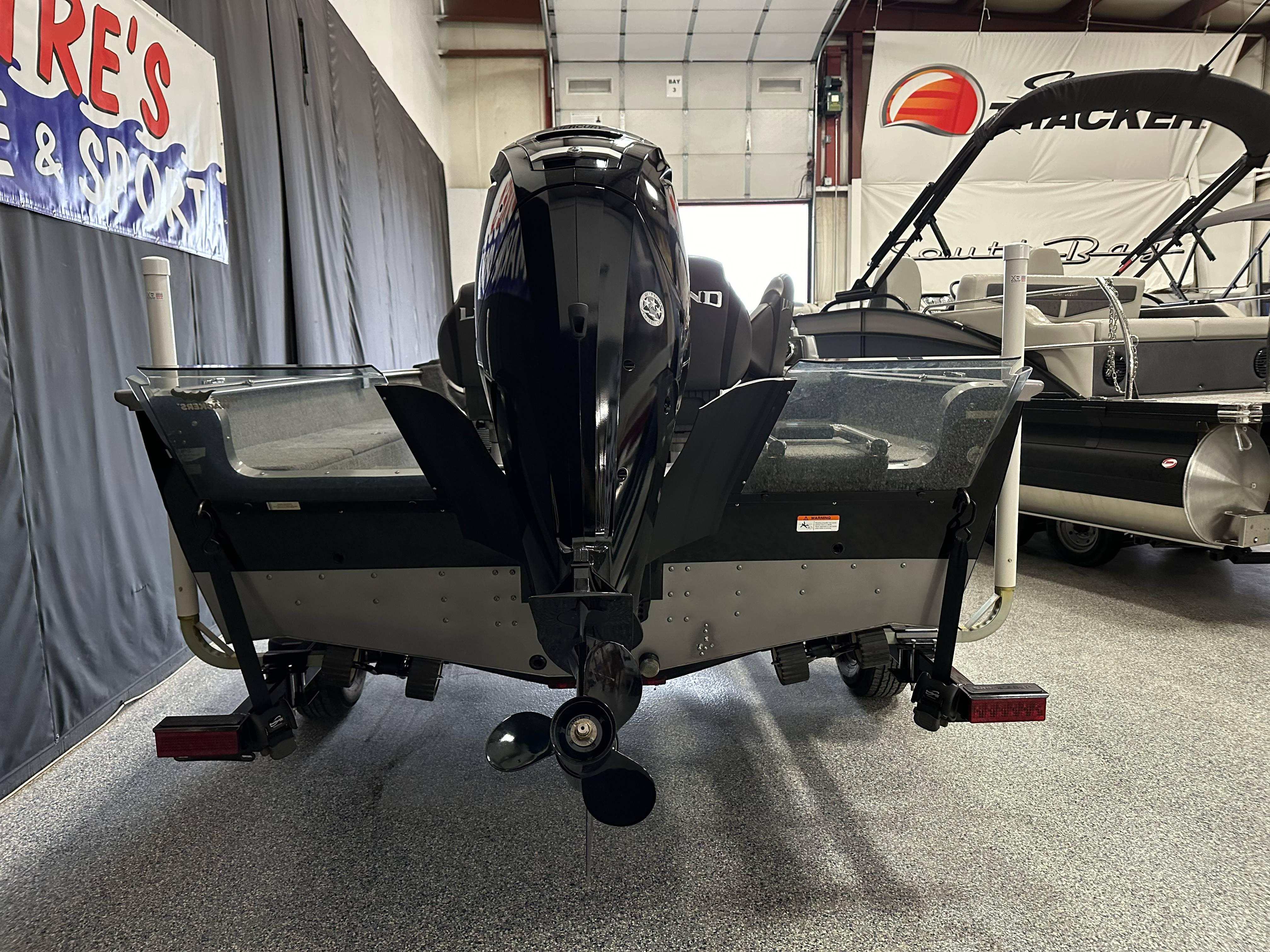 2017 Lund 1675 Impact SS boat, rear view in showroom.
