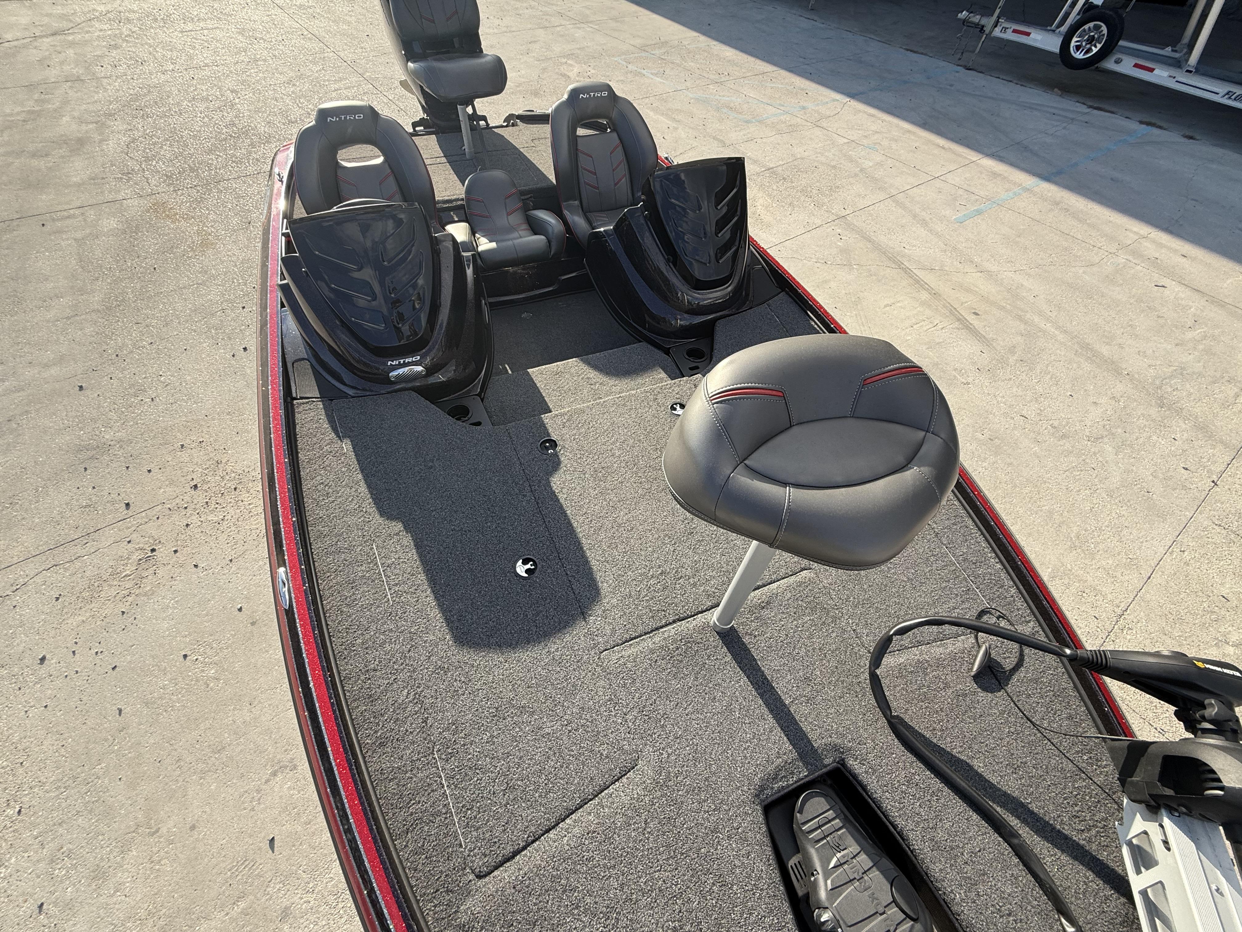 2019 Nitro Z18 DC boat interior with seating and carpeted deck.