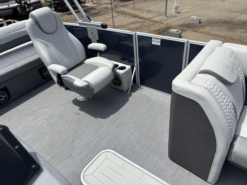 Luxurious seating on 2025 Godfrey Monaco 235 DFL pontoon boat, featuring plush gray upholstery.