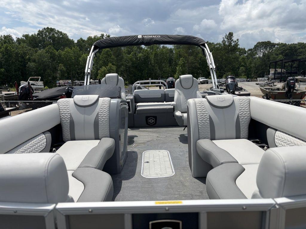2025 Godfrey Monaco 235 DFL pontoon boat with luxurious seating and sleek design.