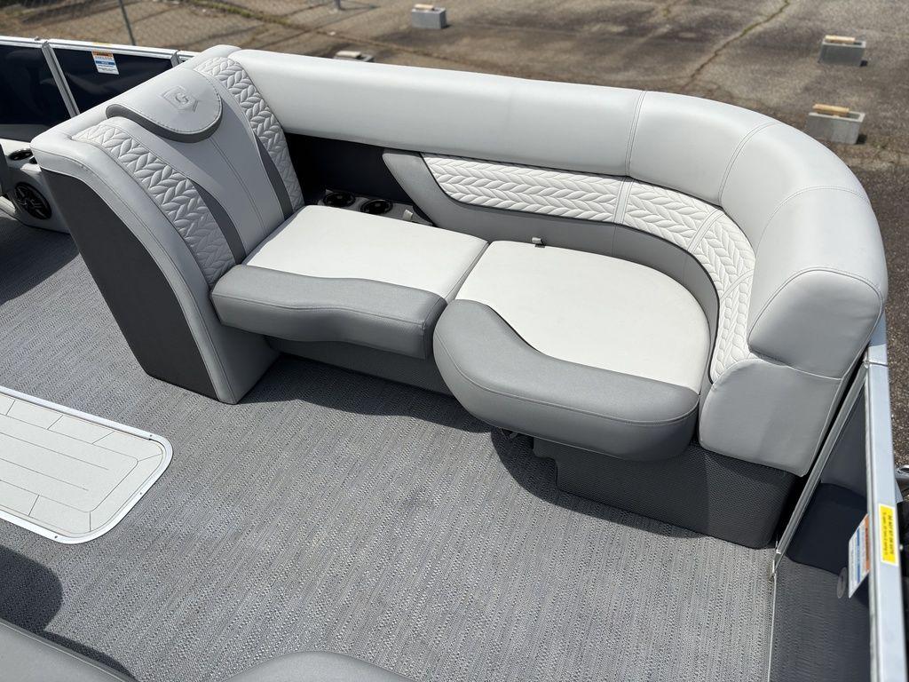 Luxurious seating on 2025 Godfrey Monaco 235 DFL pontoon boat, featuring elegant gray upholstery.