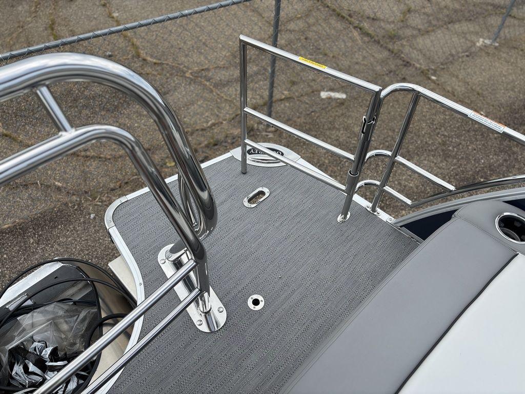 2025 Godfrey Monaco 235 DFL boat deck with stainless steel railings and textured flooring.