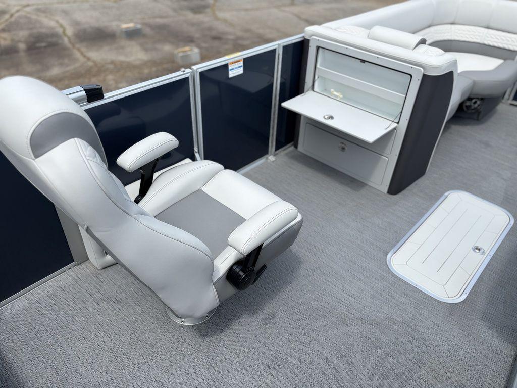 2025 Godfrey Monaco 235 DFL boat interior with luxurious seating and storage.