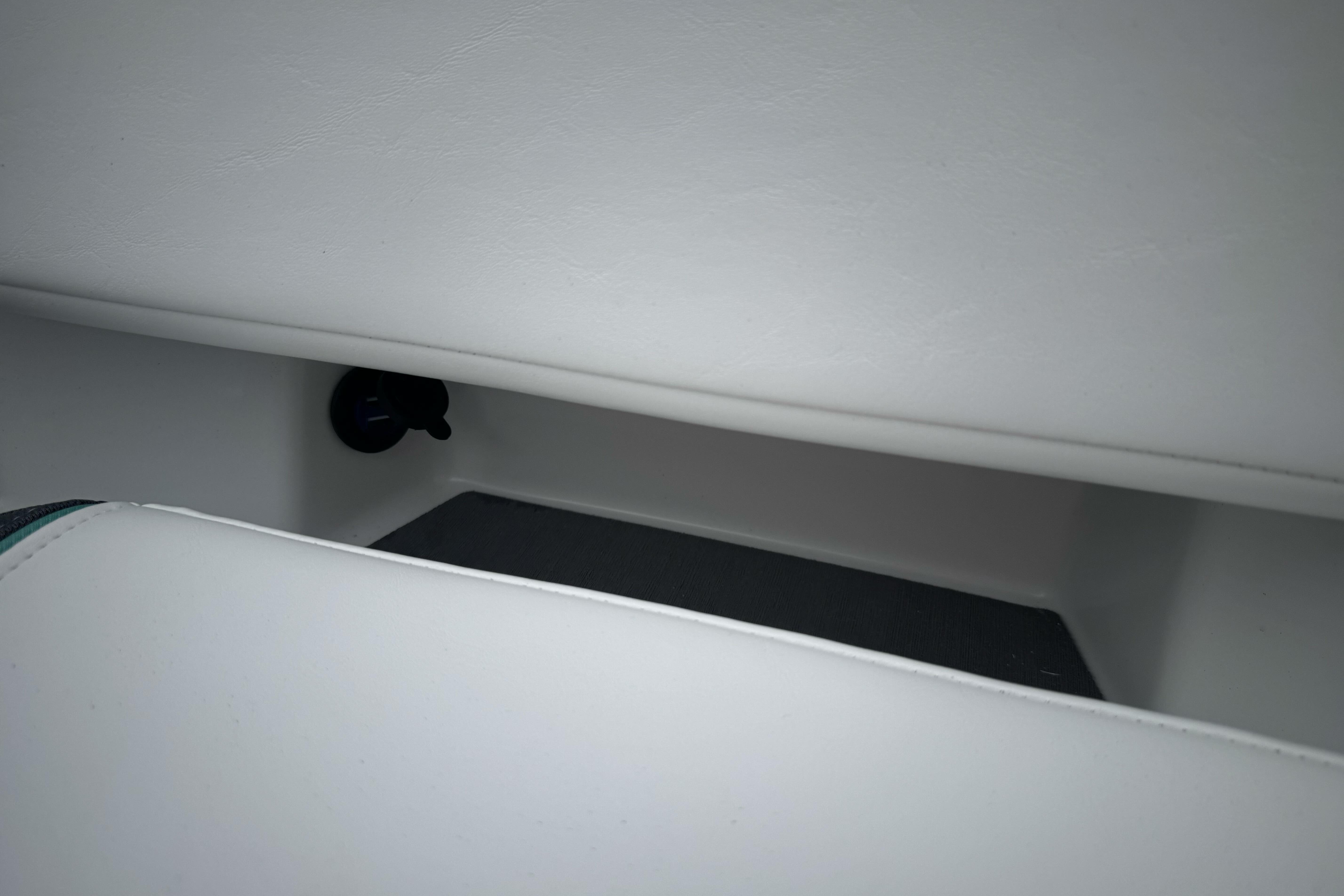 2026 Tahoe T18 interior storage compartment with sleek white finish.