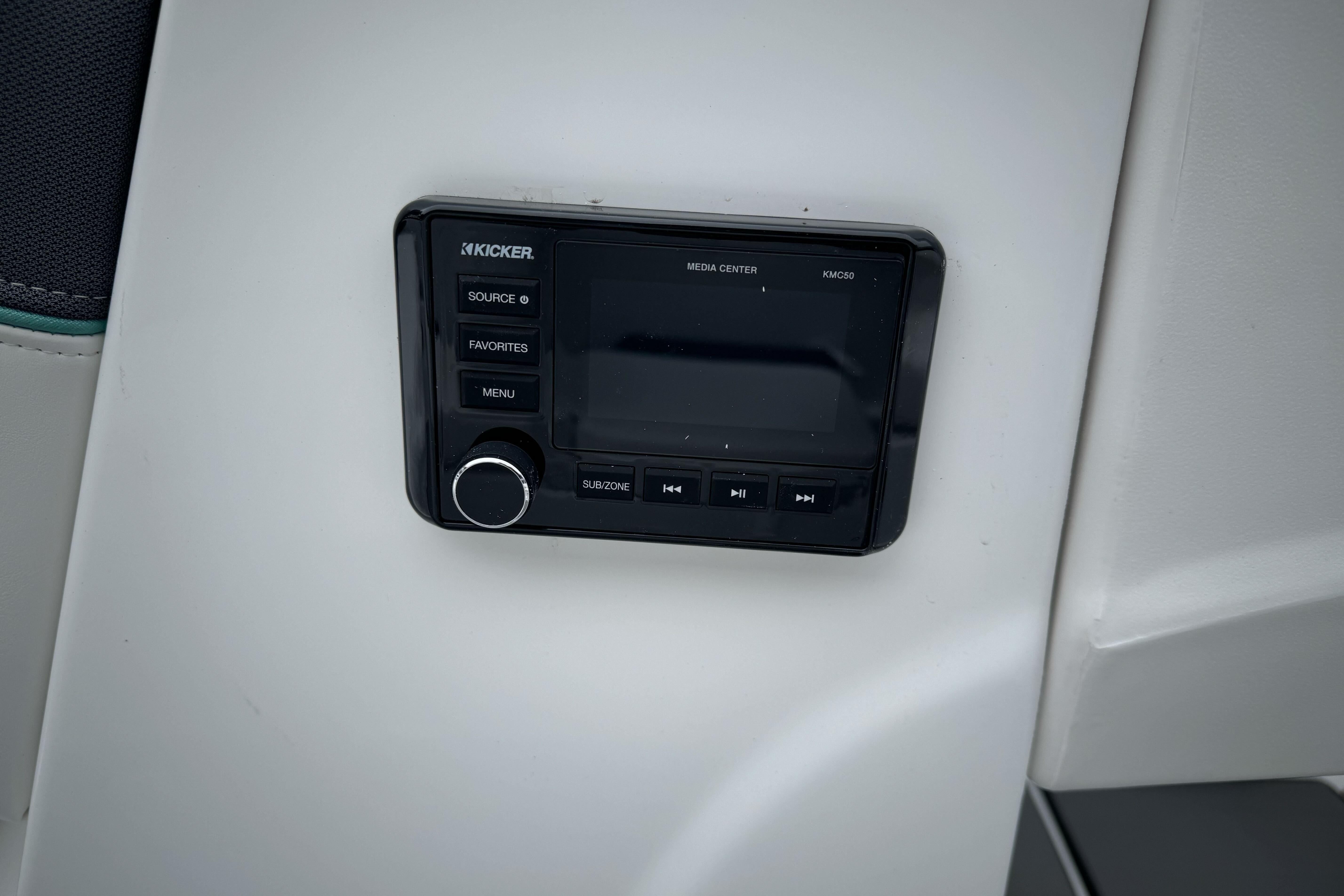 2026 Tahoe T18 boat media center with Kicker audio system.