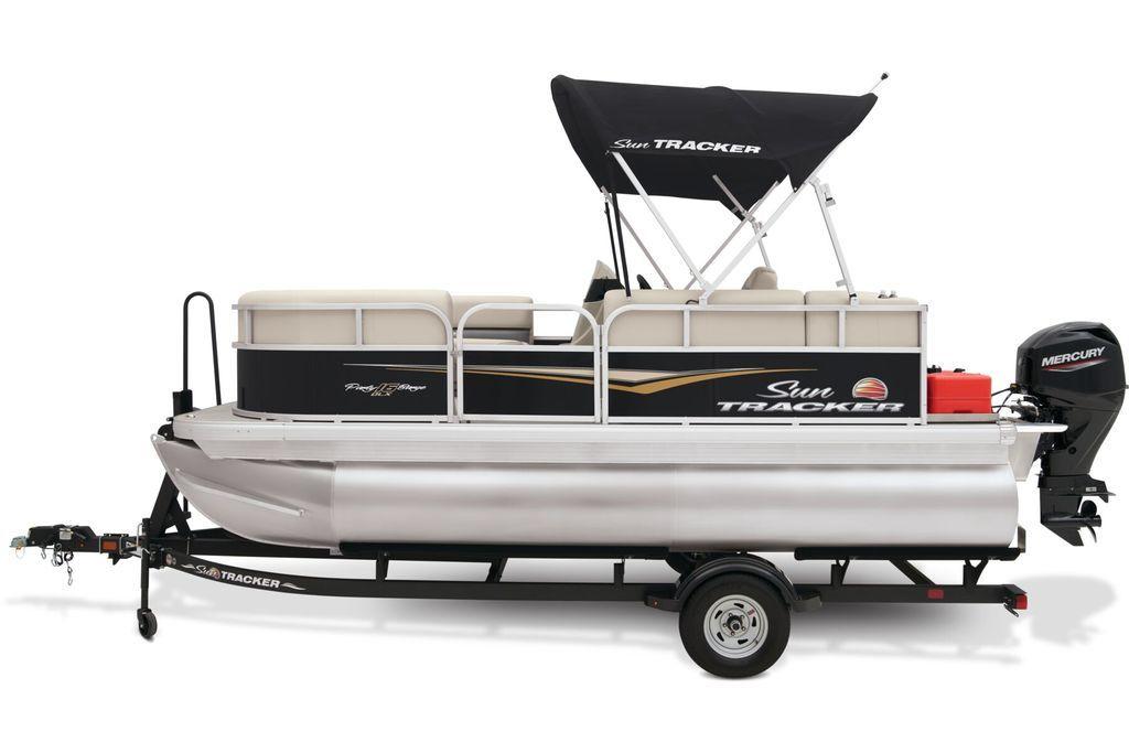 2024 Sun Tracker PARTY BARGE® 16 DLX pontoon boat with canopy and trailer.