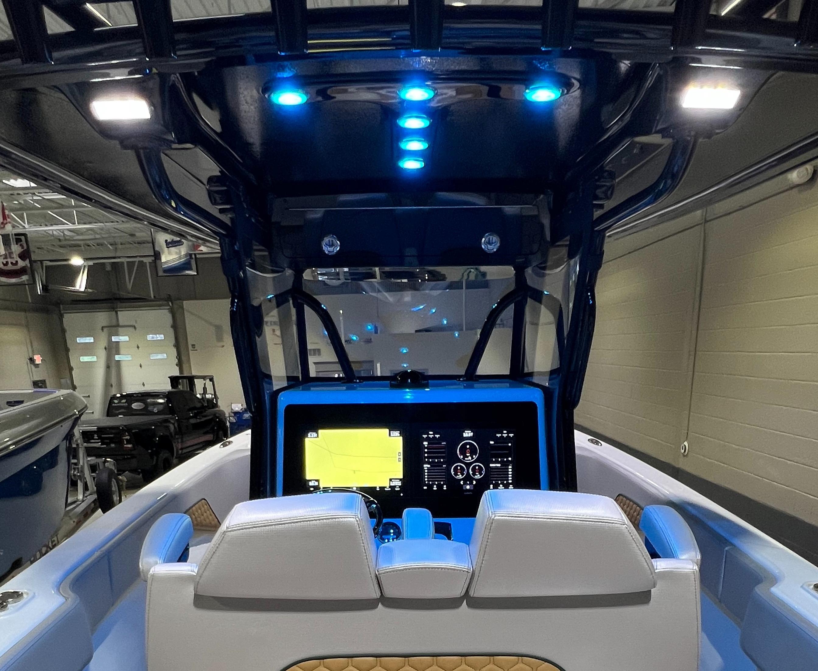 Blackwater-36 Sport 2022 -MI-US-2022 Blackwater 36 Sport boat interior with illuminated dashboard and seating.-8355779 | Thumbnail