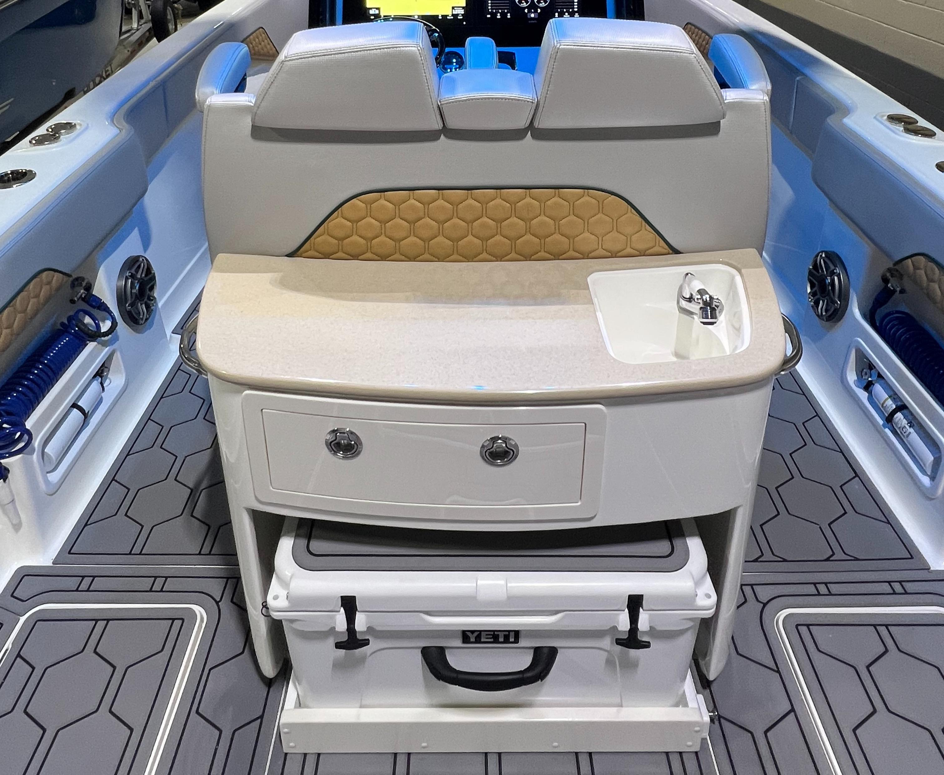 Blackwater-36 Sport 2022 -MI-US-2022 Blackwater 36 Sport boat interior with seating, storage, and cooler.-8355779 | Thumbnail