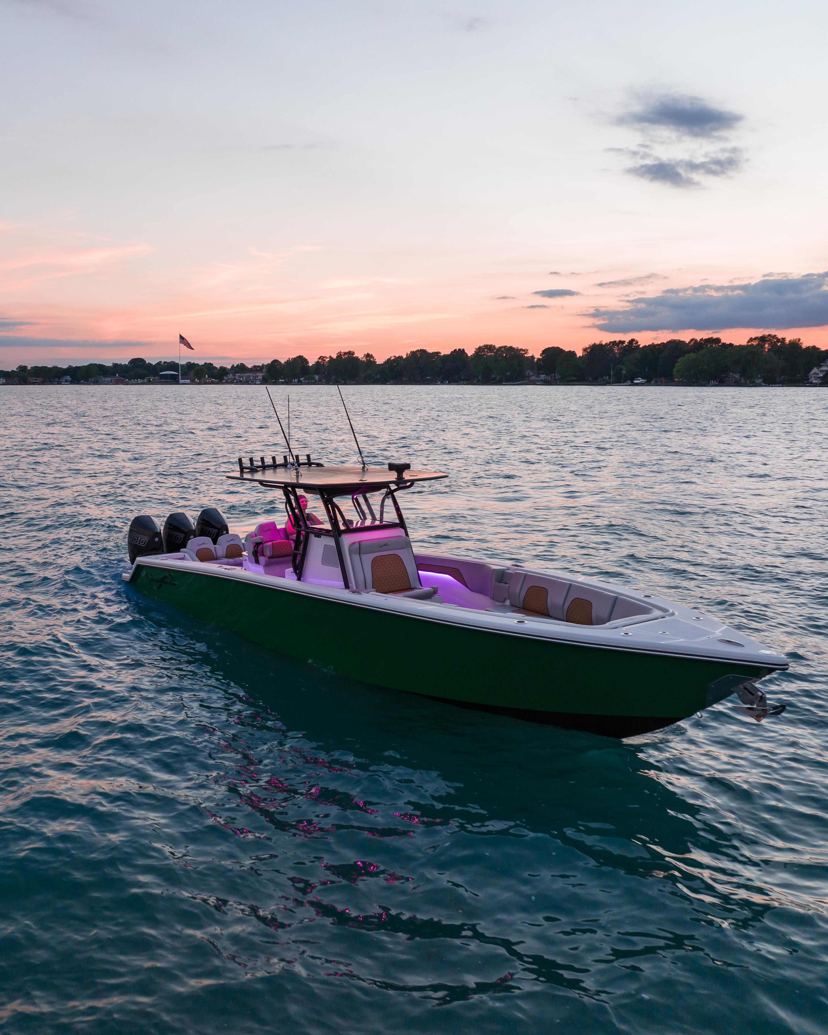 Blackwater-36 Sport 2022 -MI-US-2022 Blackwater 36 Sport boat on serene water at sunset.-8355779