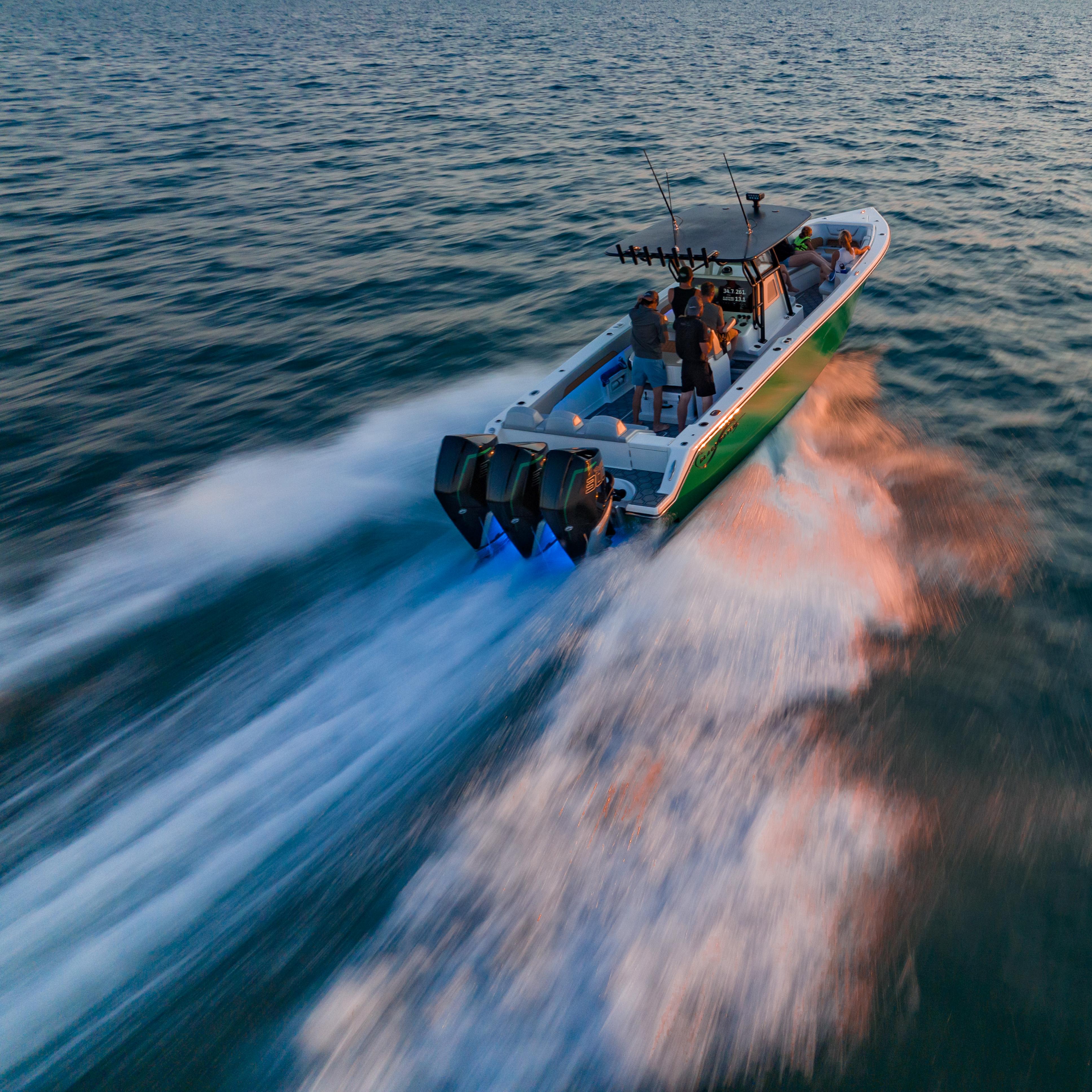 Blackwater-36 Sport 2022 -MI-US-2022 Blackwater 36 Sport boat speeding on open water at sunset.-8355779 | Thumbnail