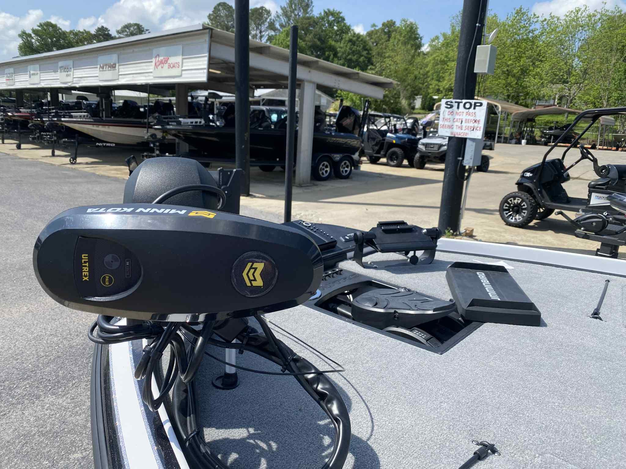 2024 Nitro Z20 Pro boat with Minn Kota trolling motor at a dealership.