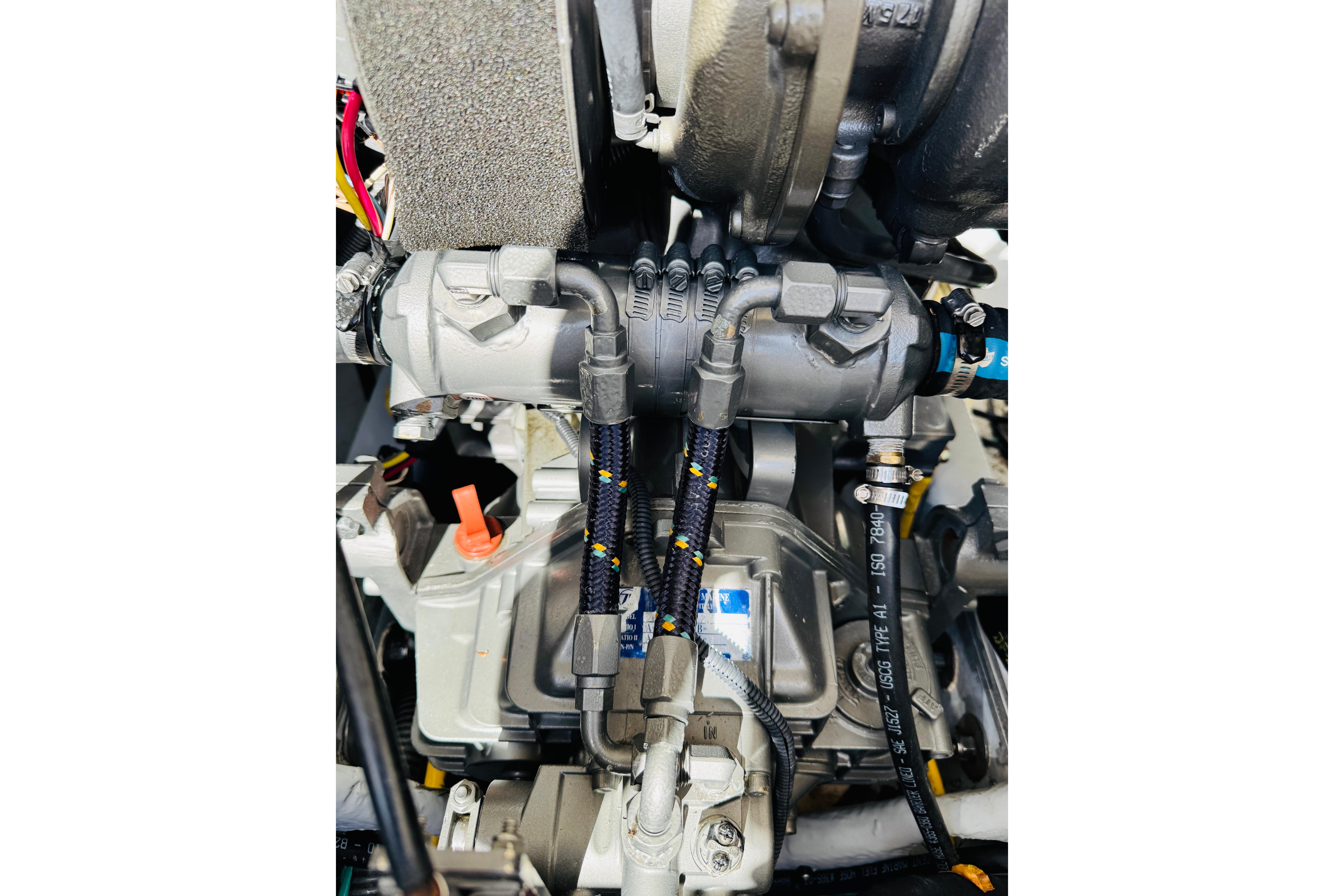 Engine components of a 2006 Mainship Pilot 30 Sedan boat.