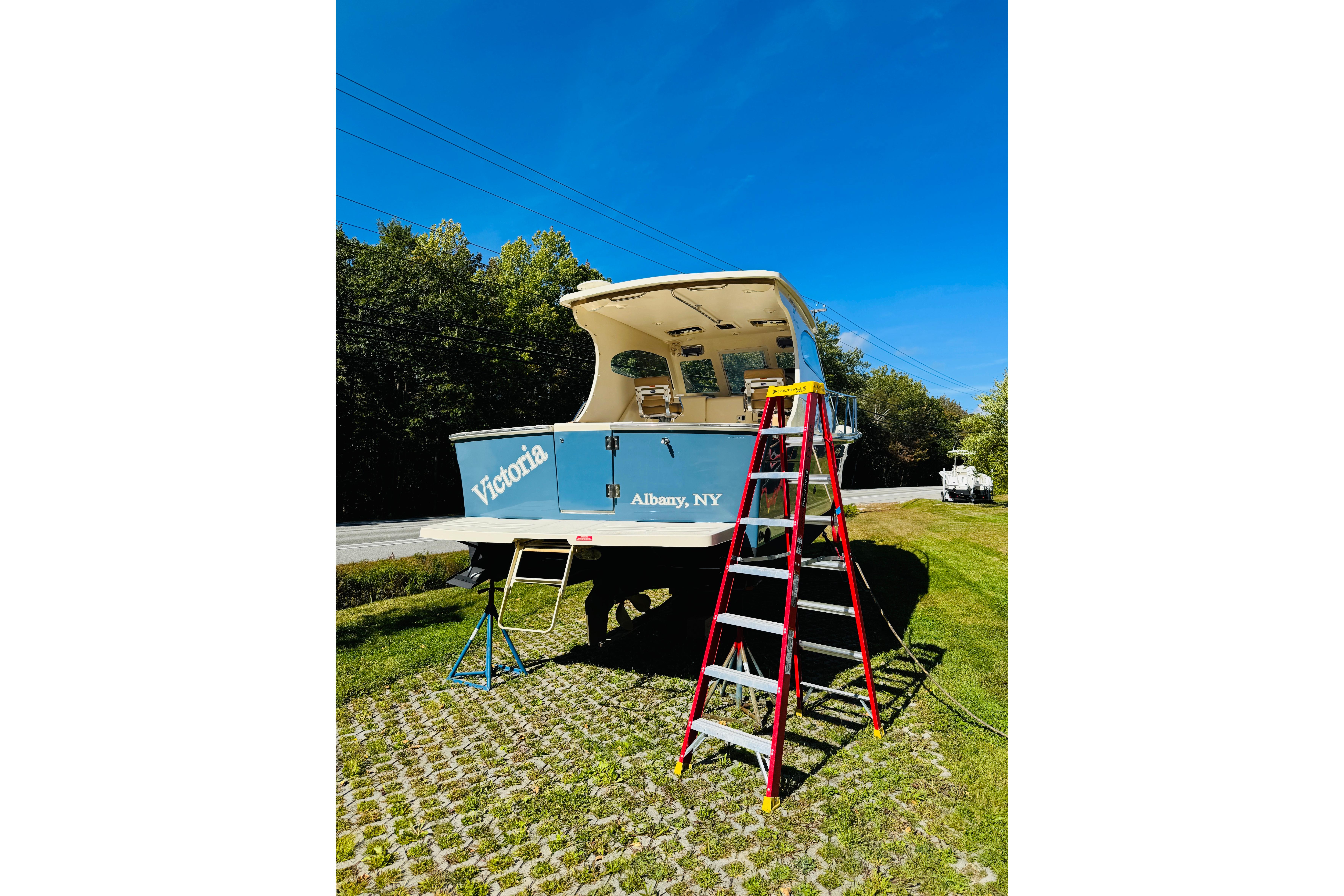 2006 Mainship Pilot 30 Sedan boat on land with ladder, Albany, NY.