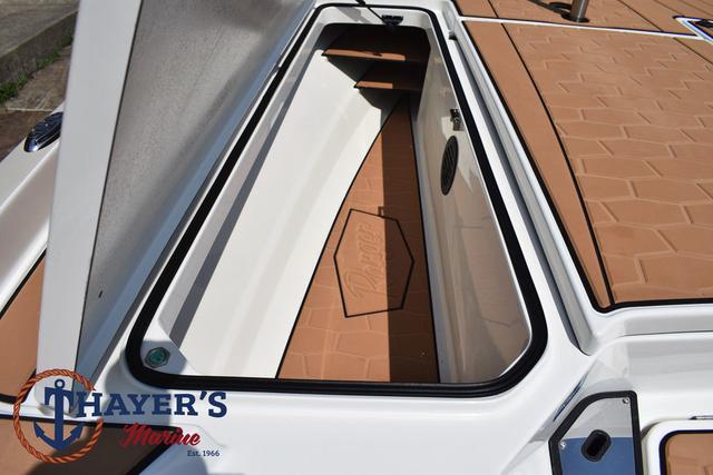2025 Ranger Z520R Cup-Equipped boat storage compartment with Thayer's Marine logo.