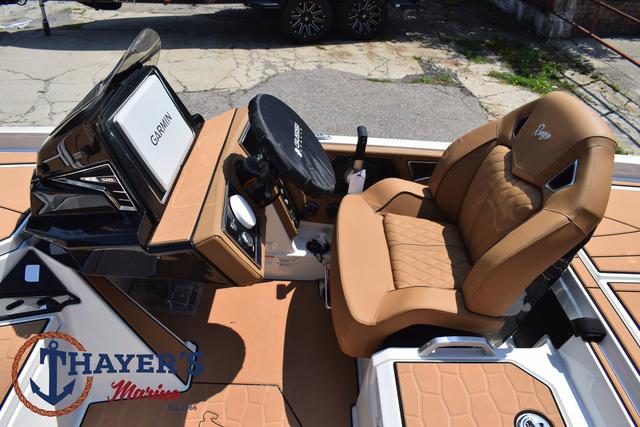 2025 Ranger Z520R Cup-Equipped boat interior with Garmin display and tan leather seating.
