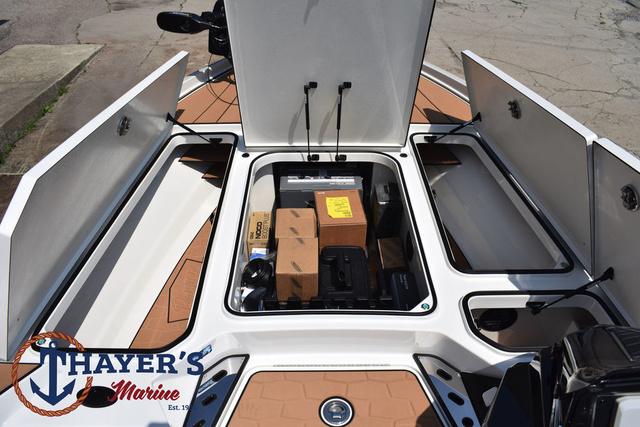 2025 Ranger Z520R Cup-Equipped boat storage compartments open, showcasing ample space and equipment.