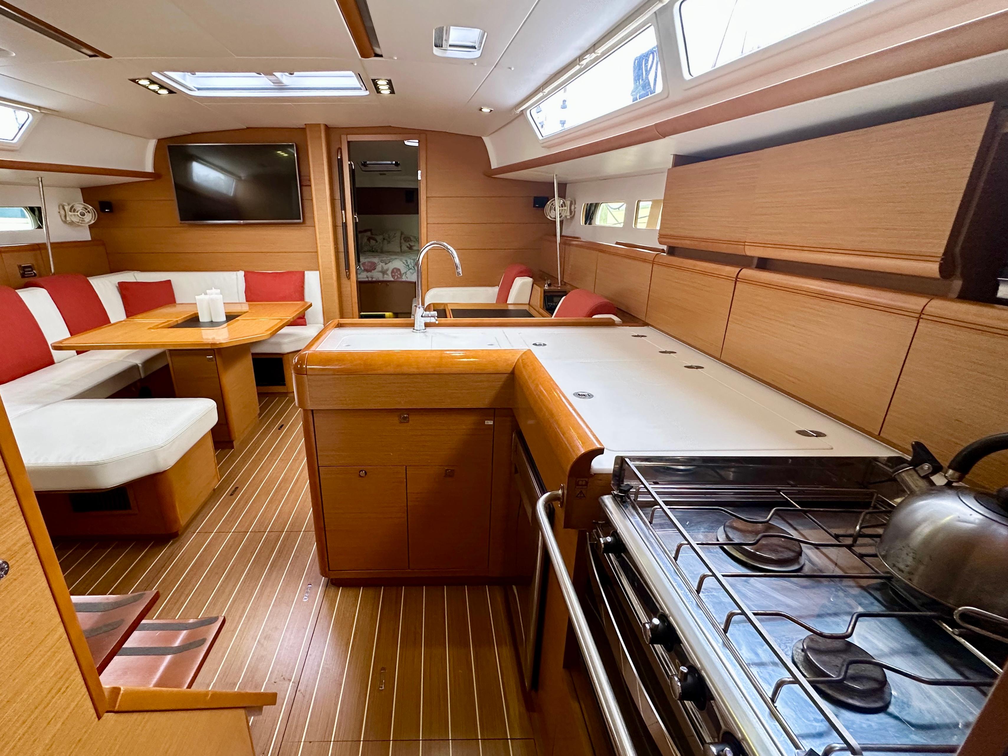Jeanneau-Sun Odyssey 469 2014-Serendipity RI-US-Interior of 2014 Jeanneau Sun Odyssey 469 yacht with modern kitchen and dining area.-9695803 | Thumbnail