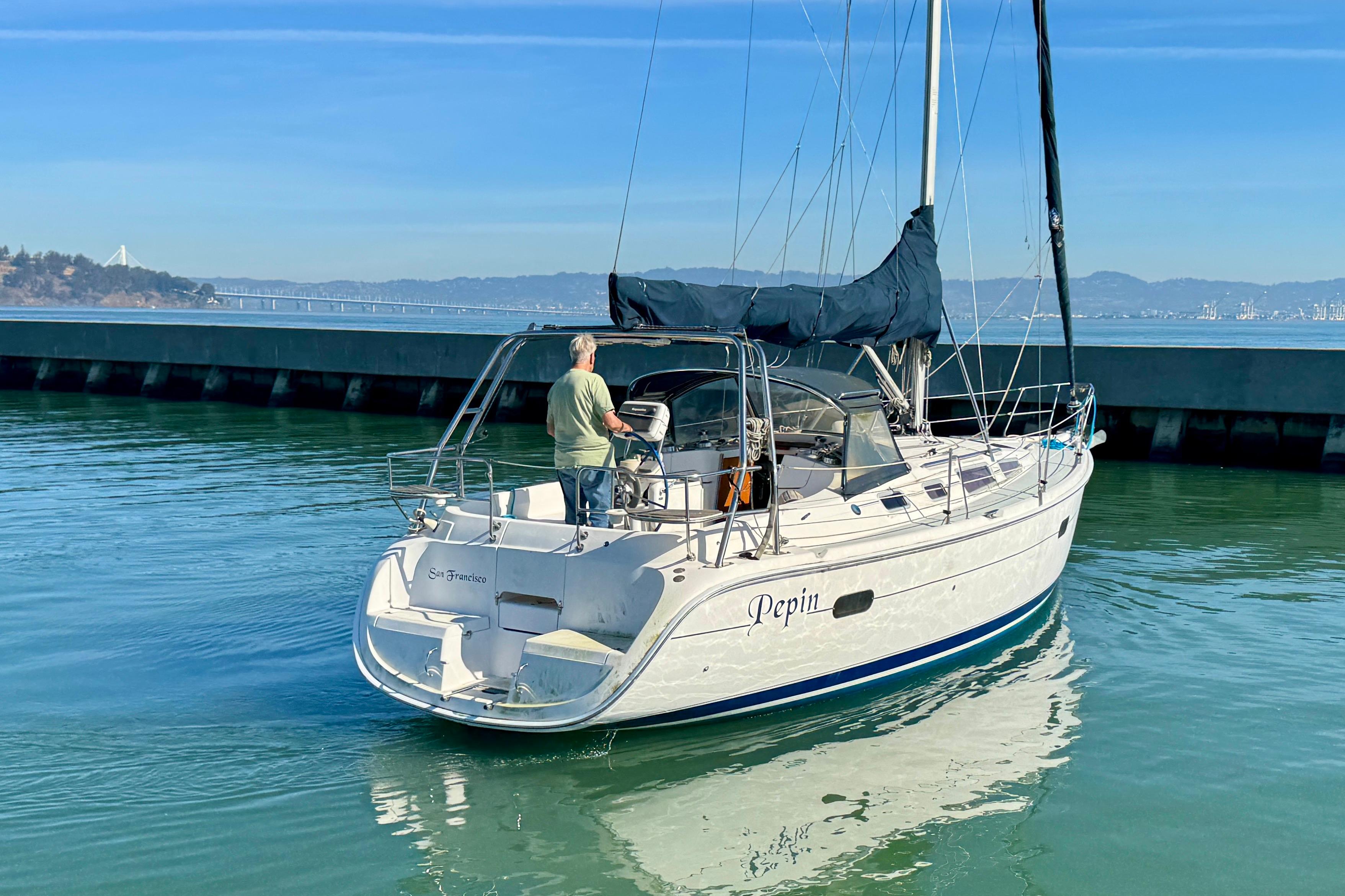 Sailboat "Pepin" on water, Hunter 36 model, 2003, San Francisco backdrop.