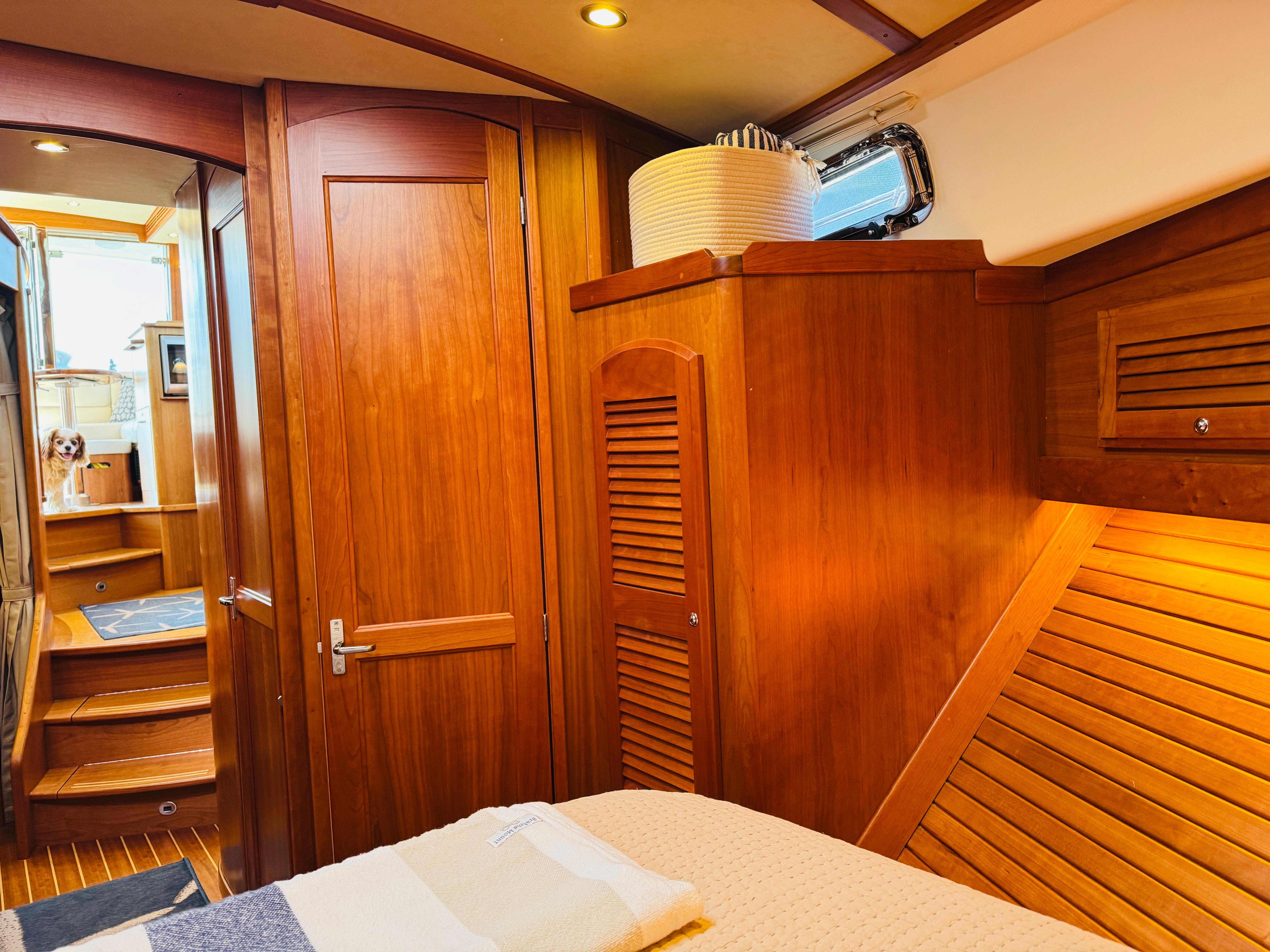 Luxurious interior of 2018 Sabre 42 Salon Express yacht with wooden finishes and cozy ambiance.