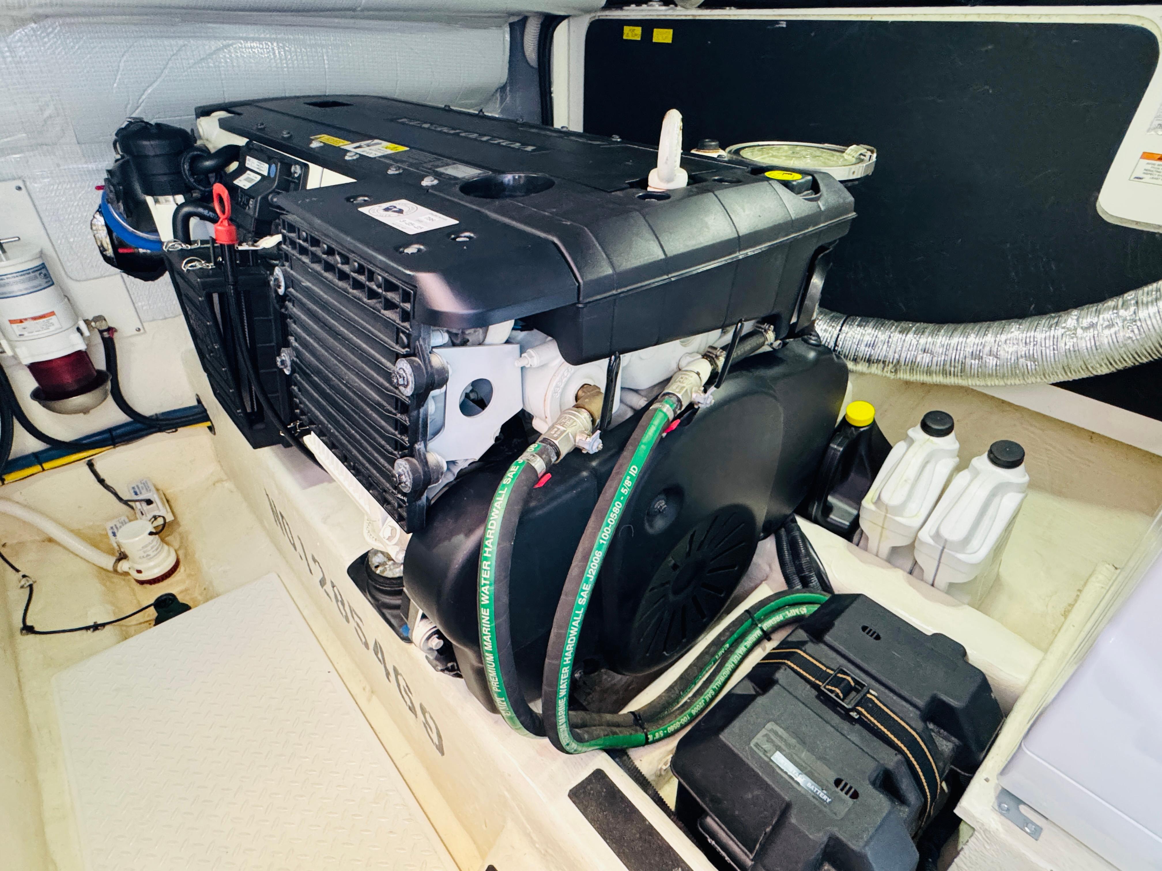 Engine room of 2018 Sabre 42 Salon Express with visible components and wiring.