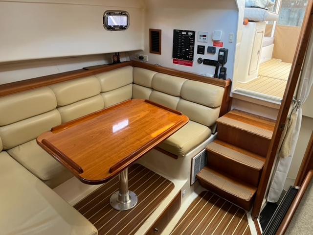 Mainship 34 Pilot Gwen's Way - Entry Way and Dinette Seating with Table