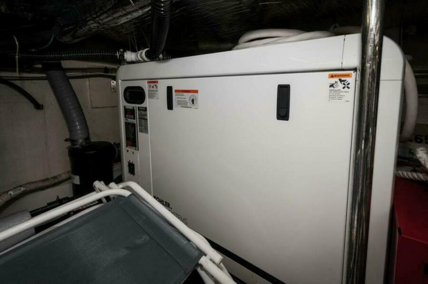 Carver-52 Voyager 2008-Chips Ahoy FL-US-2008 52 Carver Voyager  Chips Ahoy  Engine Room  Generator-9745889 | Thumbnail