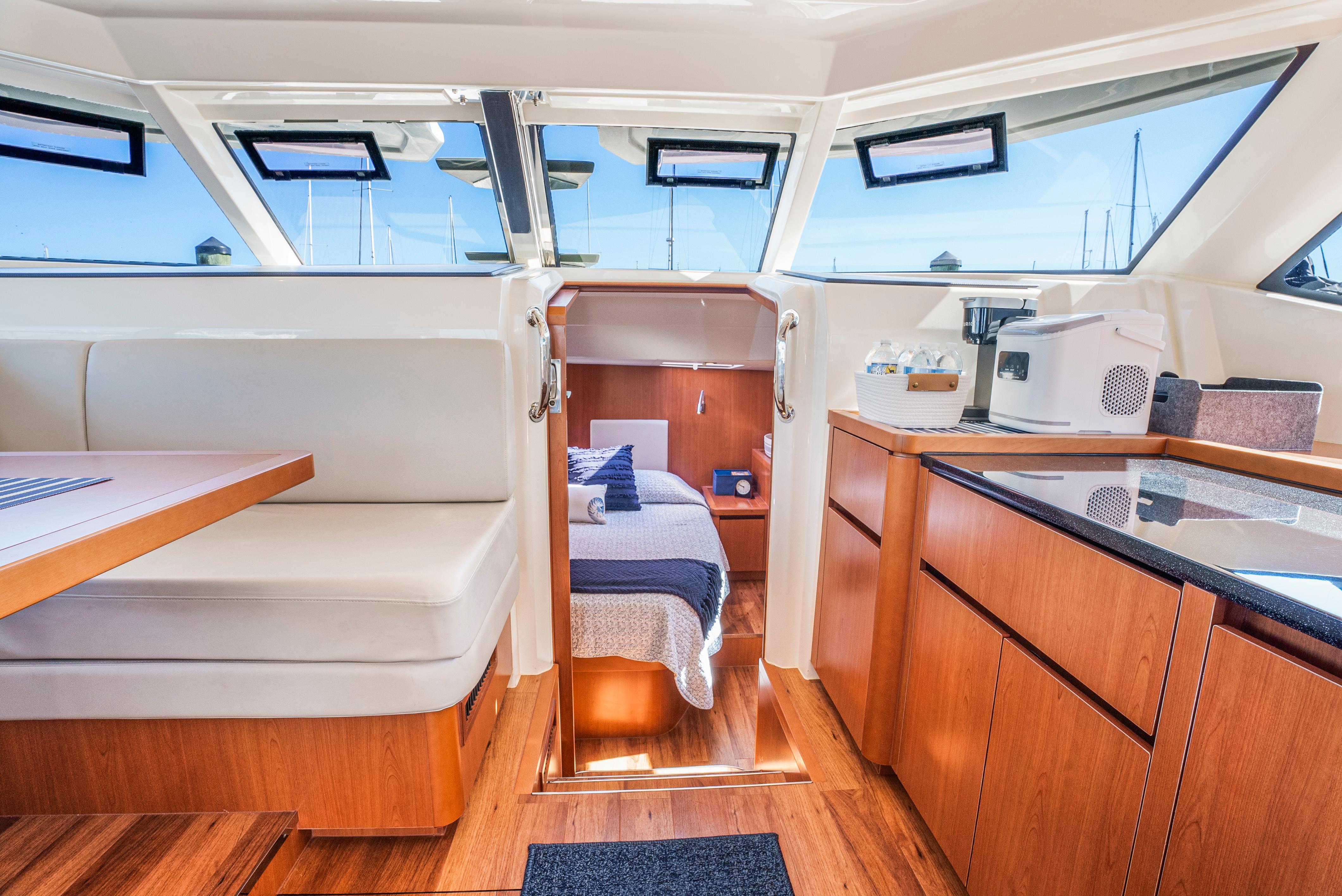 Aquila-44 Yacht 2017-Ryans Inheritance FL-US-Interior of 2017 Aquila 44 Yacht featuring dining area, kitchenette, and cozy cabin.-9835915 | Thumbnail