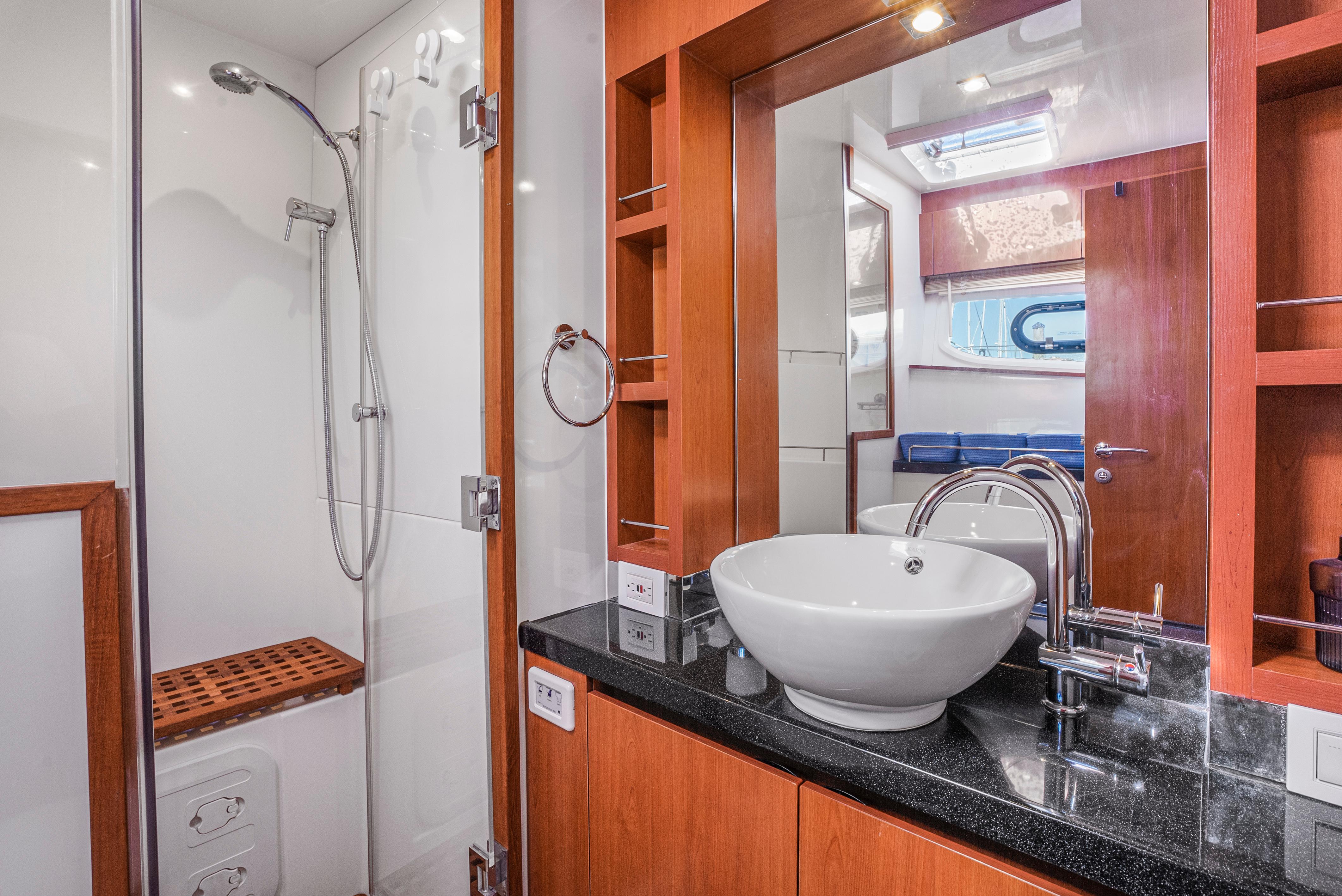 Aquila-44 Yacht 2017-Ryans Inheritance FL-US-Luxurious bathroom in 2017 Aquila 44 Yacht with modern sink and shower.-9835915 | Thumbnail