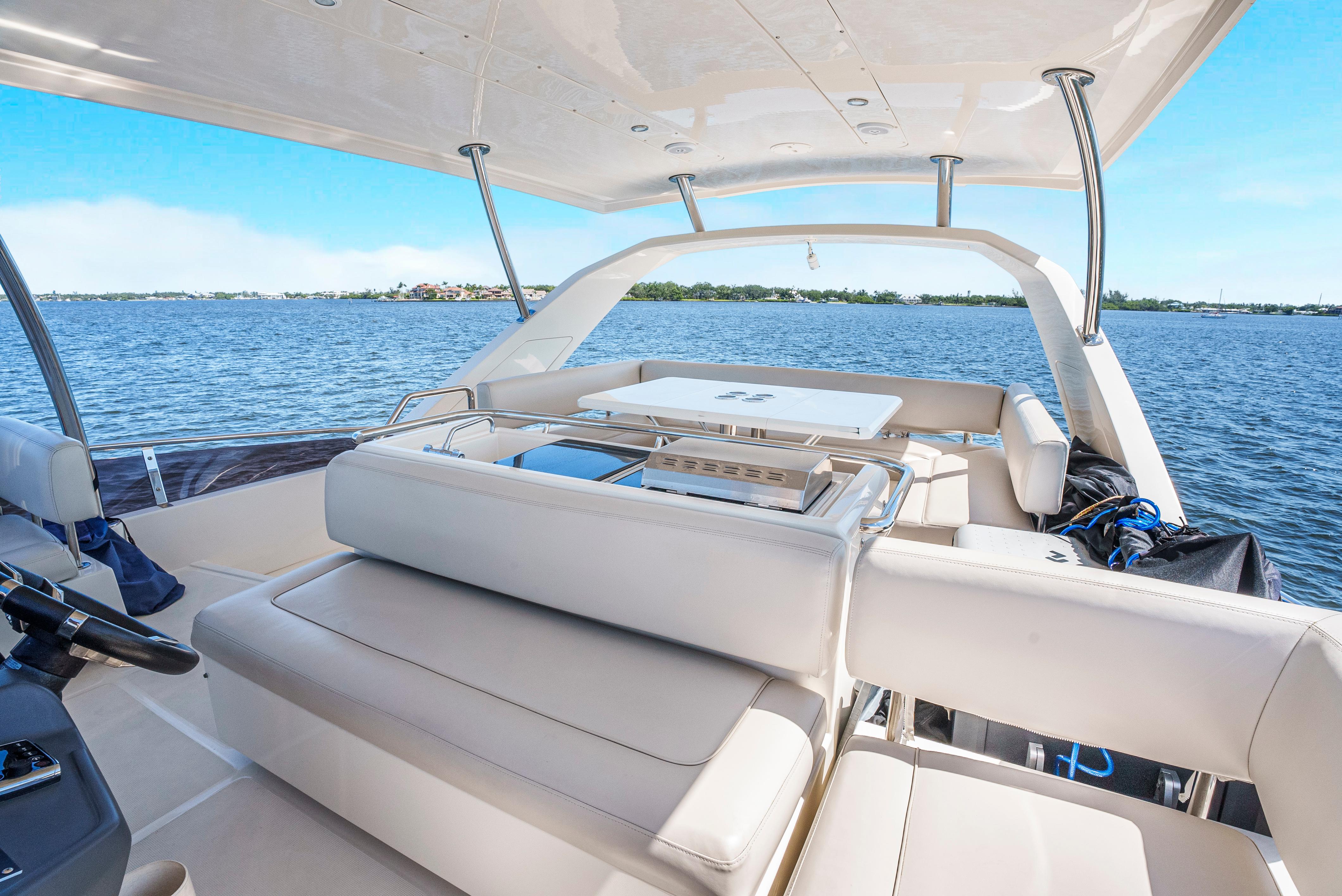 Aquila-44 Yacht 2017-Ryans Inheritance FL-US-Luxurious 2017 Aquila 44 Yacht interior with seating, overlooking serene blue waters.-9835915 | Thumbnail