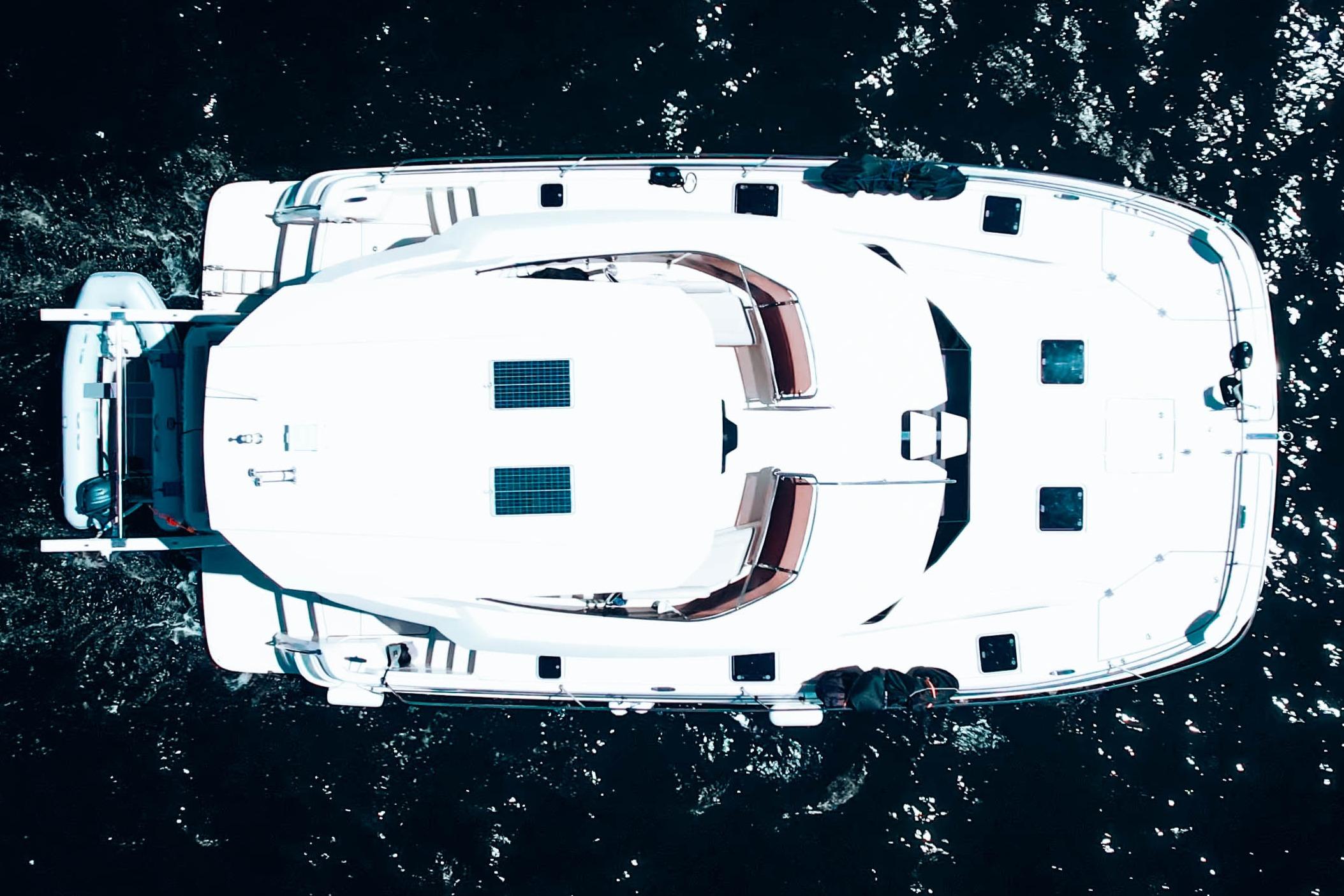 Aquila-44 Yacht 2017-Ryans Inheritance FL-US-Overhead view of 2017 Aquila 44 Yacht on dark water.-9835915 | Thumbnail