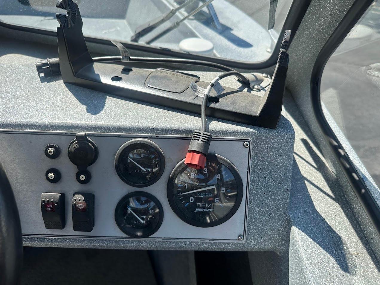 Dashboard of a 2008 Jetcraft 1925 Adventurer boat with gauges and controls.