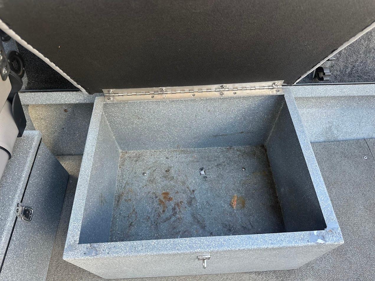 Open storage compartment in a 2008 Jetcraft 1925 Adventurer boat.