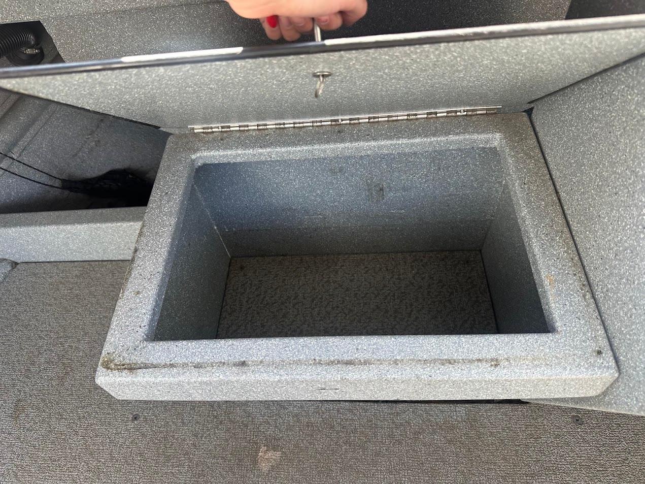 Open storage compartment in a 2008 Jetcraft 1925 Adventurer boat.