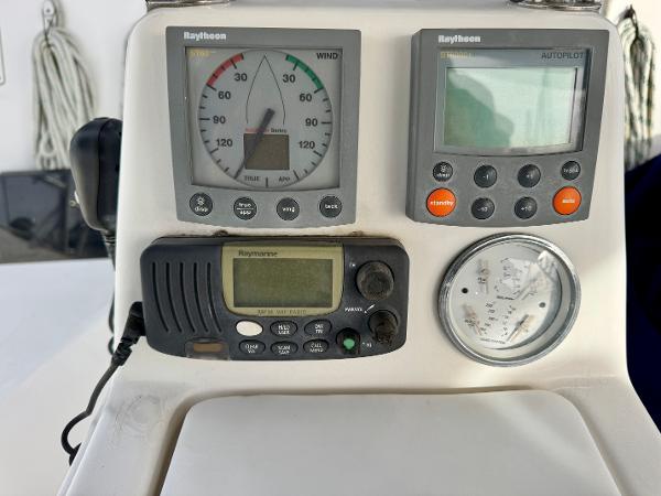 Control panel of a 2000 Hunter 340 sailboat with Raytheon instruments.